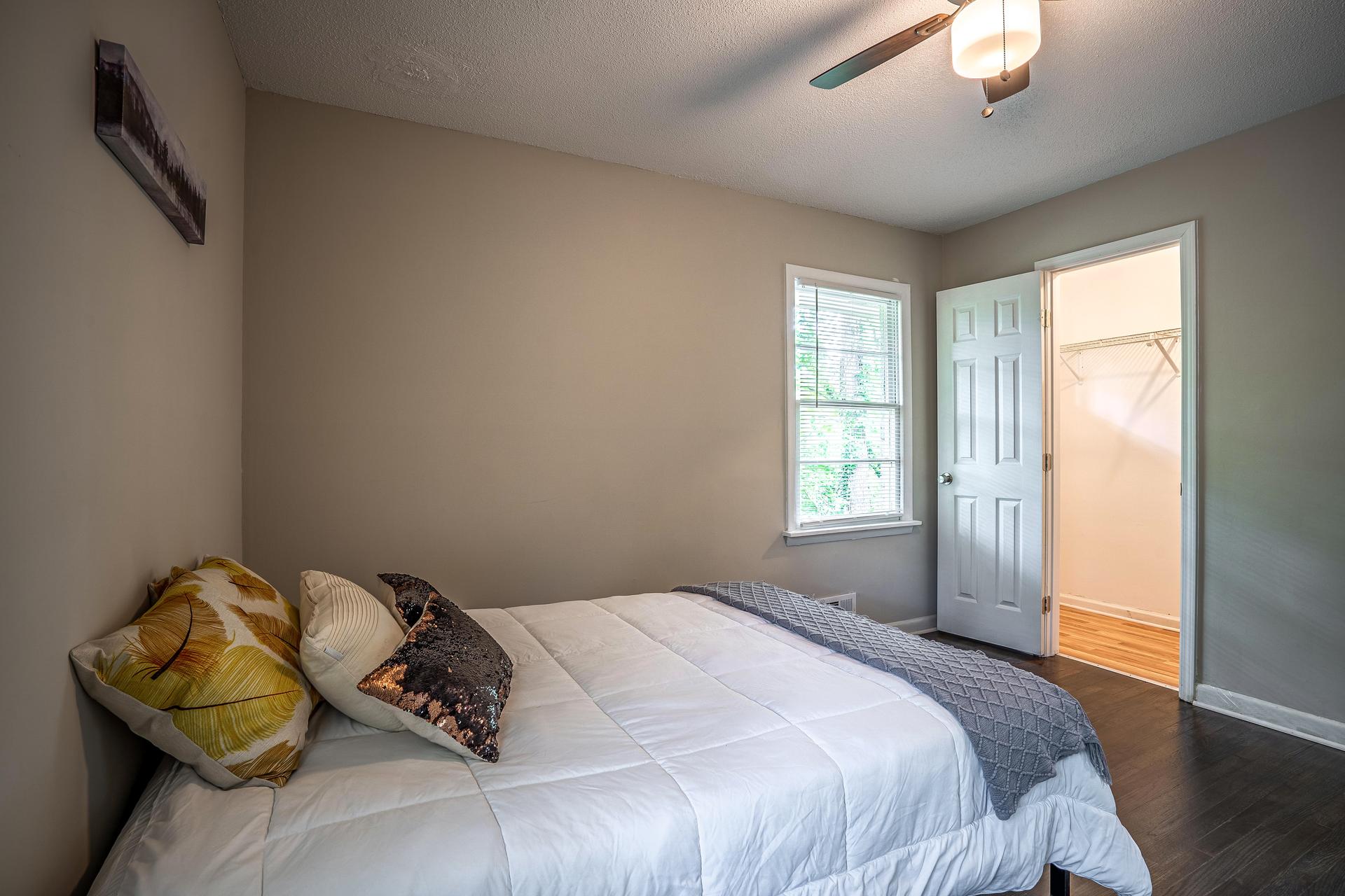 bedroom, detected: ceiling fan, bed, window blind