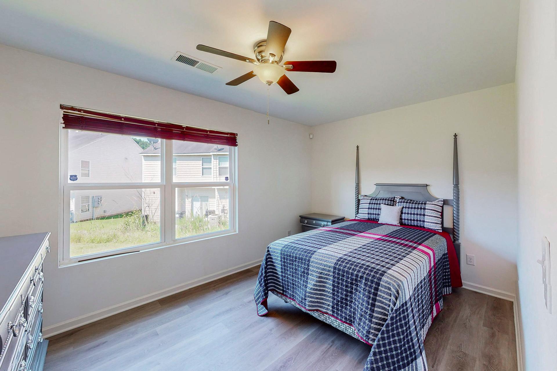 bedroom, detected:ceiling fan, window blind, bed