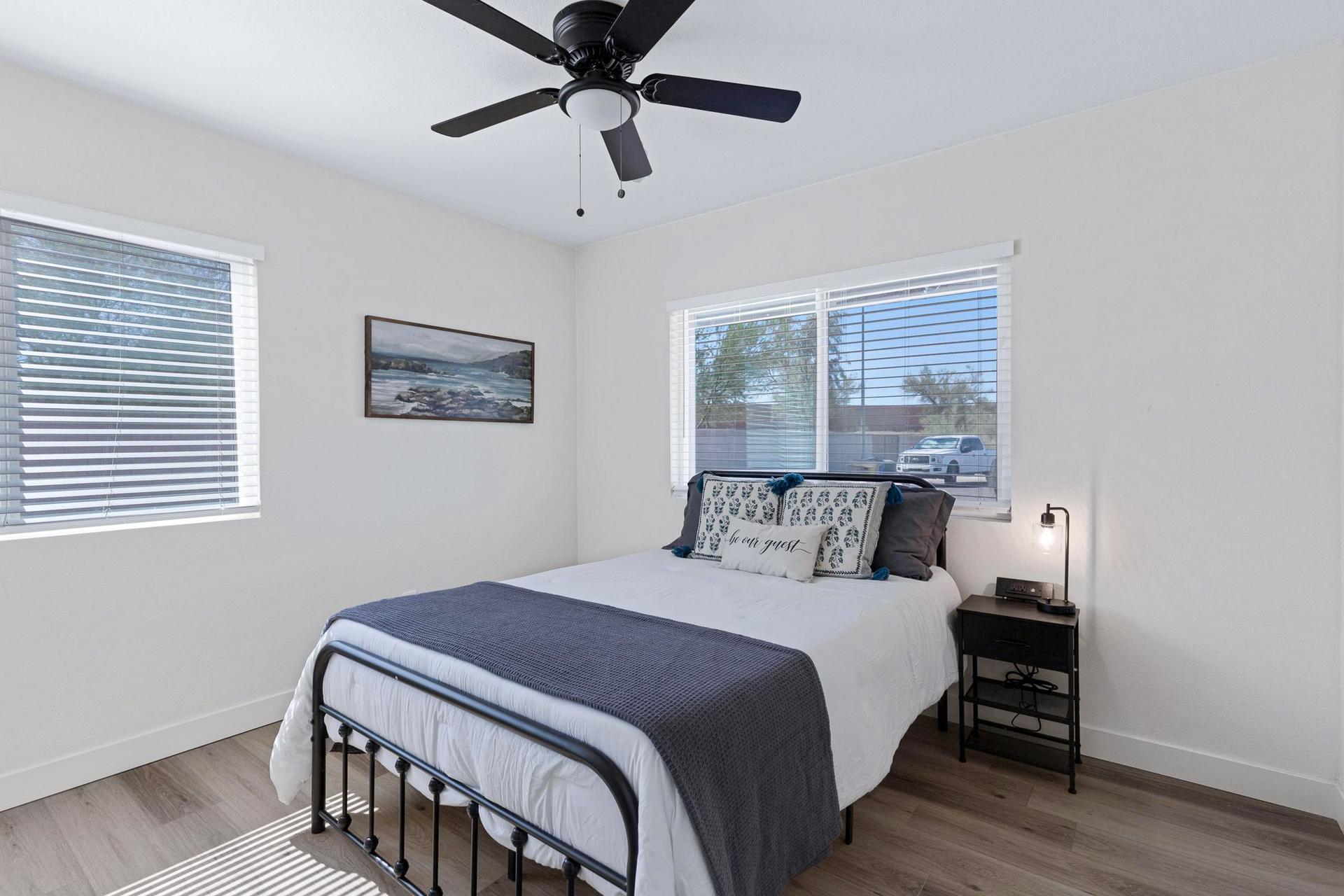 bedroom, detected:ceiling fan, window blind, bed