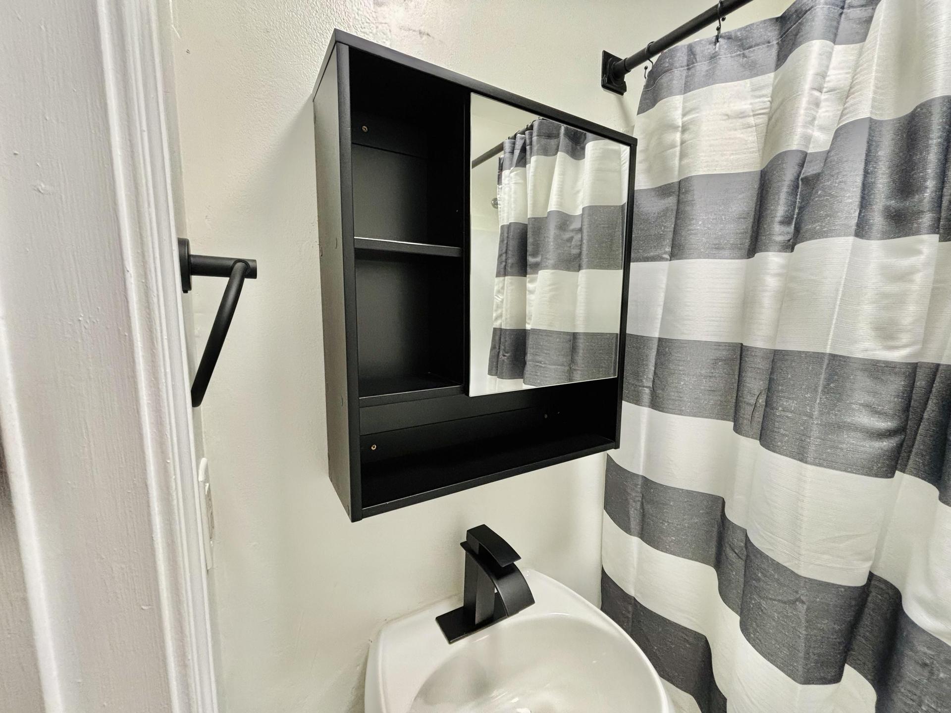Shared hallway bathroom with tub and shower combo