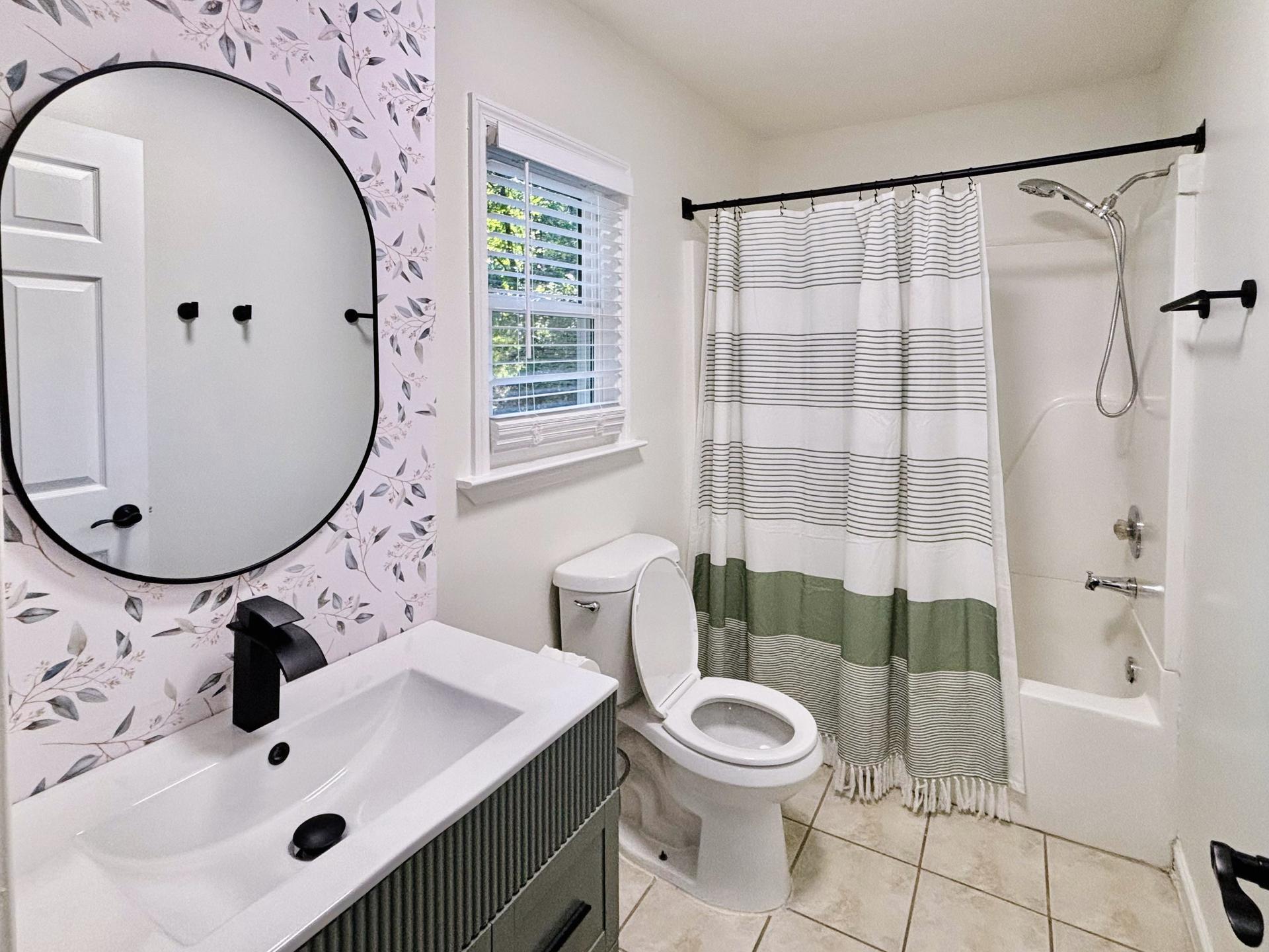 bathroom, detected:window blind, bathtub, shower