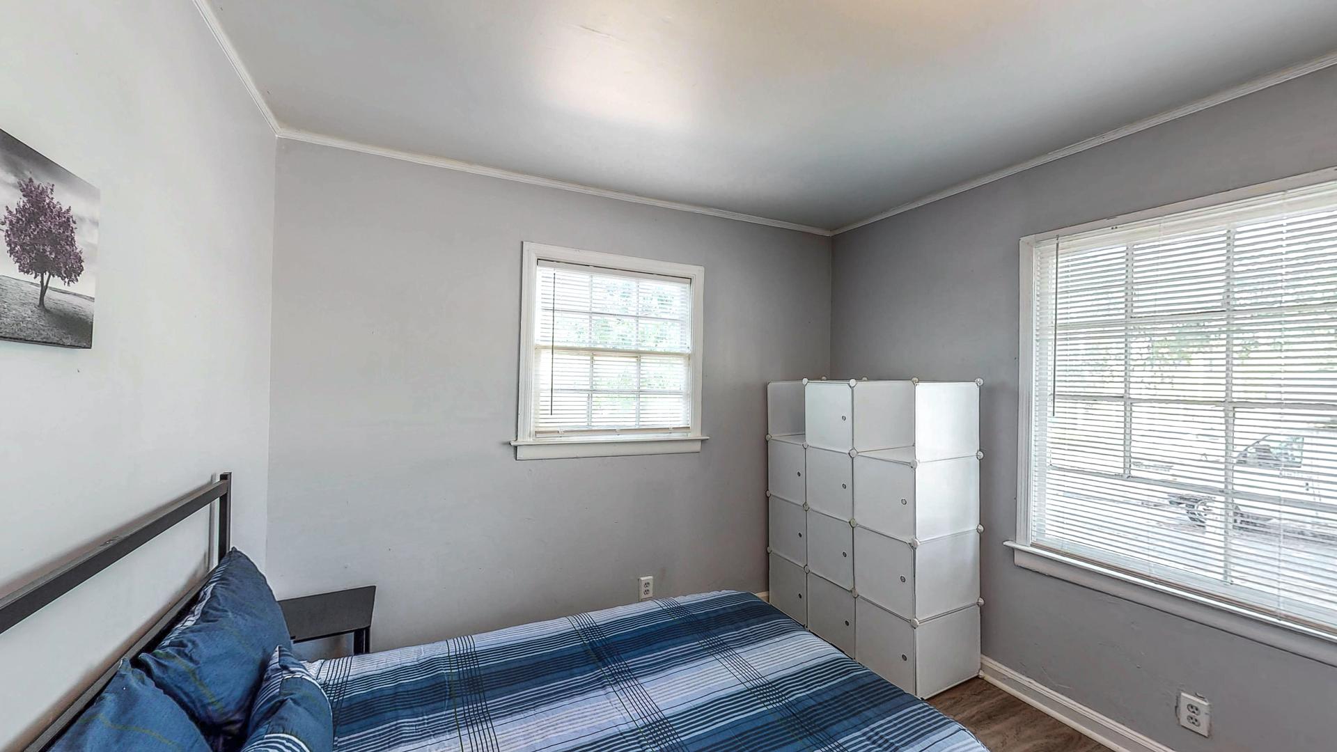 bedroom, detected: window blind, bed
