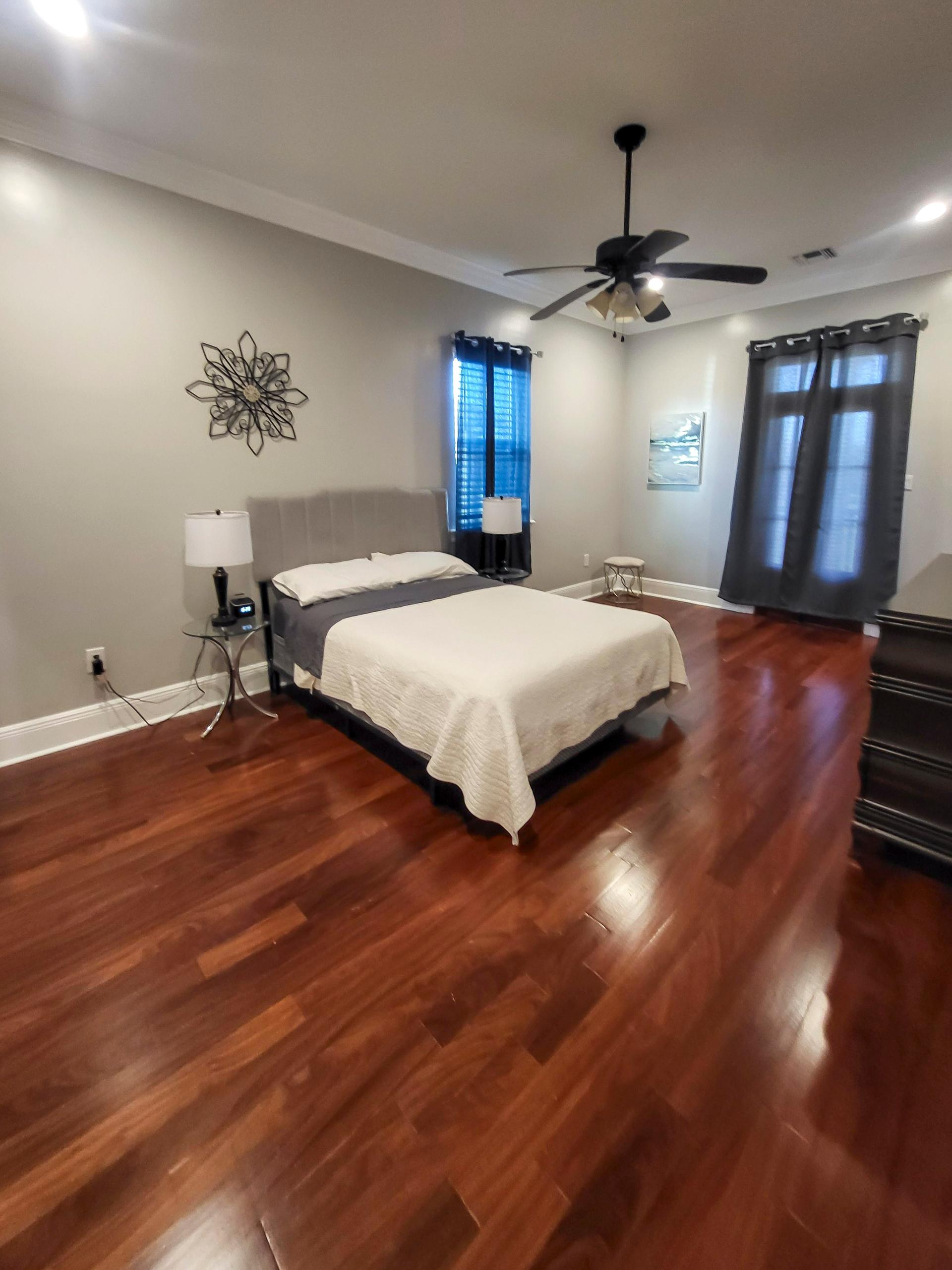 bedroom, detected:bed, ceiling fan, window blind