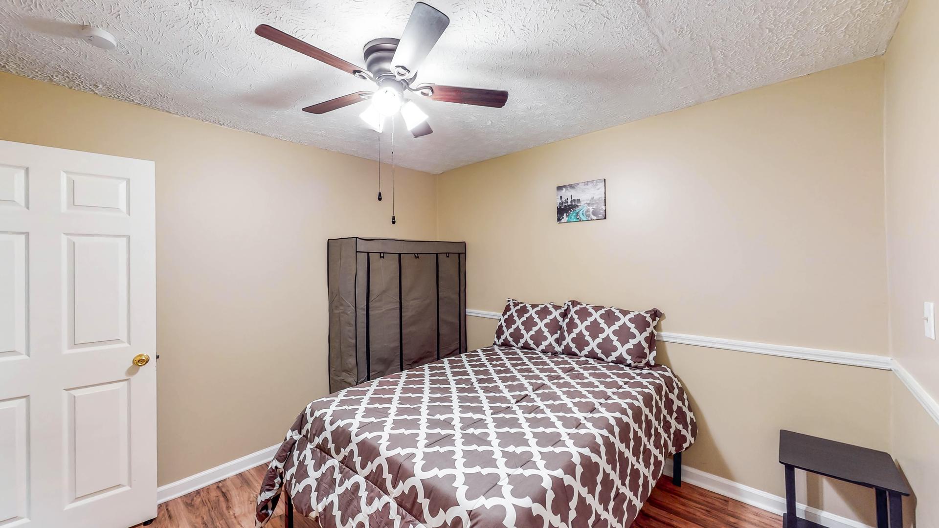 bedroom, detected: ceiling fan, bed, window blind