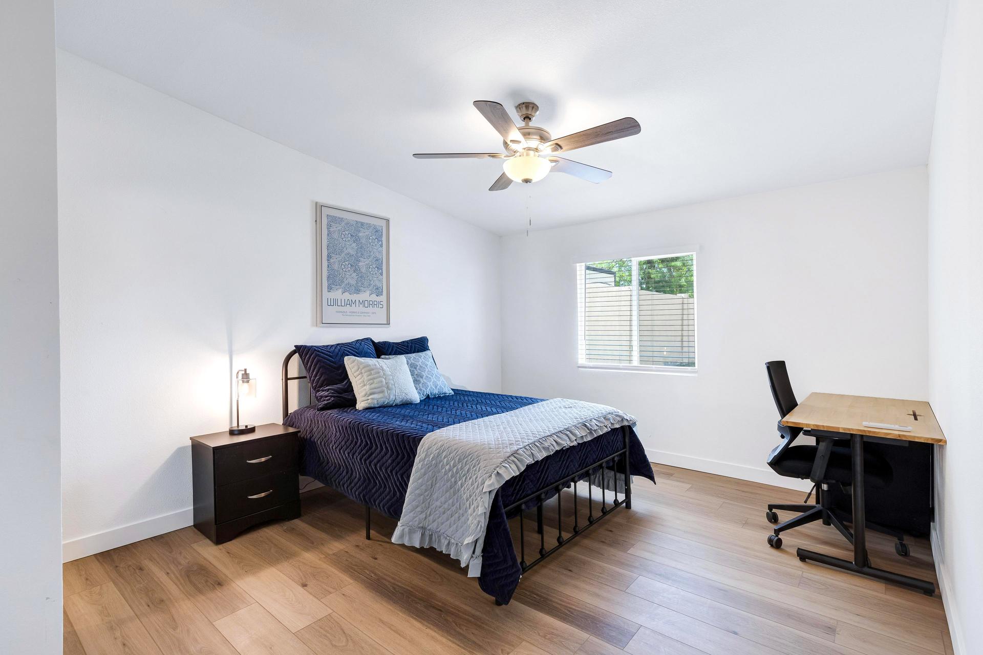 bedroom, detected:window blind, ceiling fan, bed