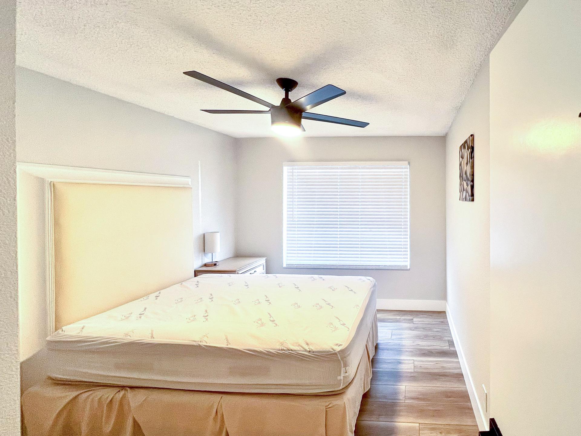 bedroom, detected:ceiling fan, bed, window blind
