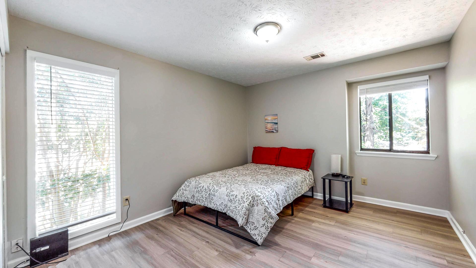 bedroom, detected: window blind, bed