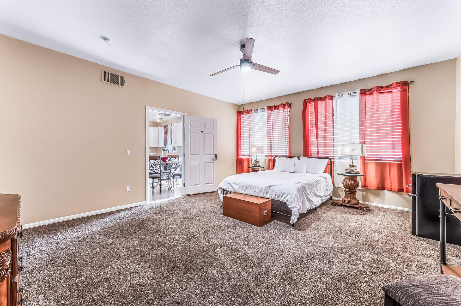 bedroom, detected:ceiling fan, window blind, bed, carpet
