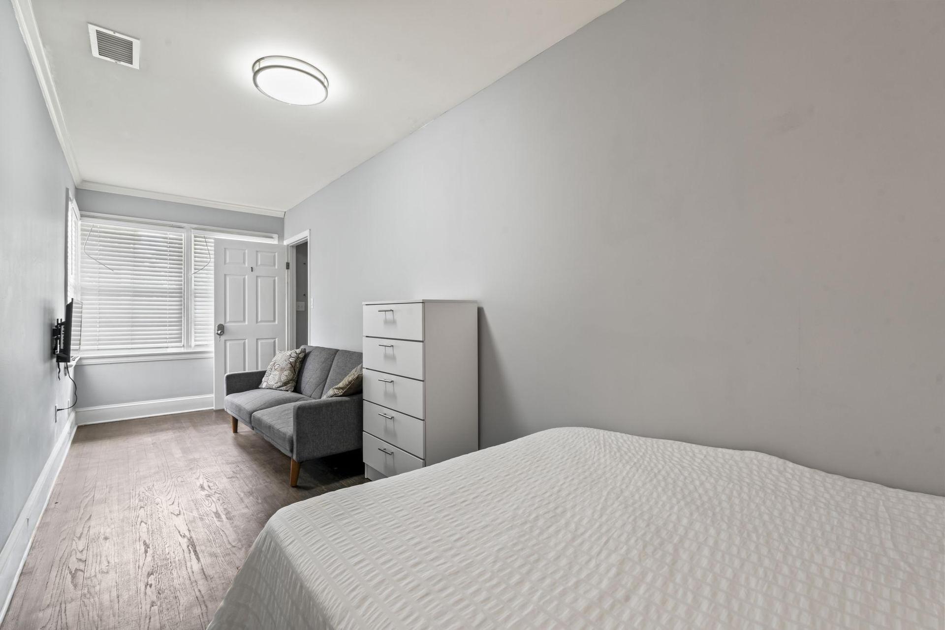 This room includes TV and sofa