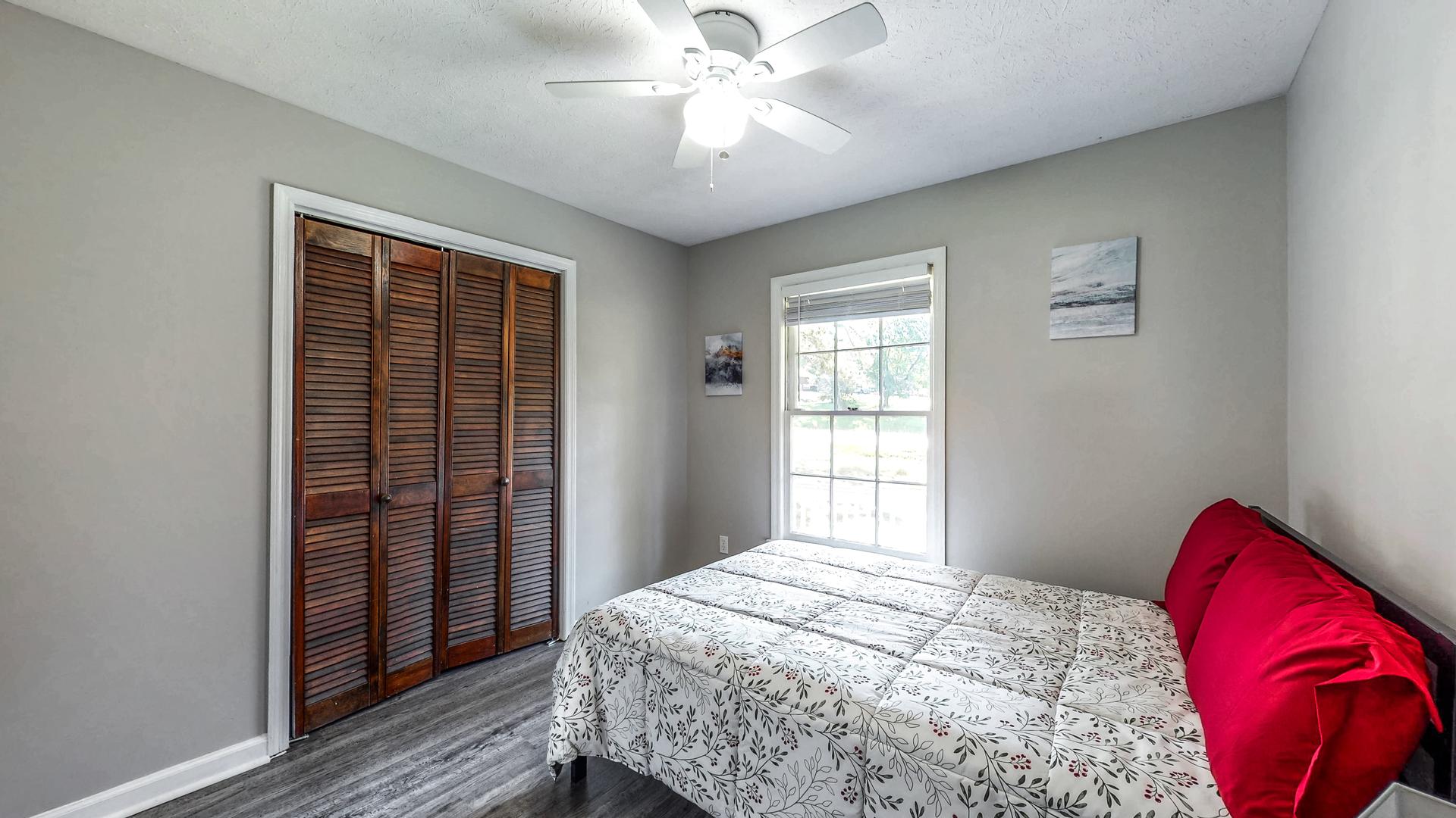 bedroom, detected: ceiling fan, window blind, bed