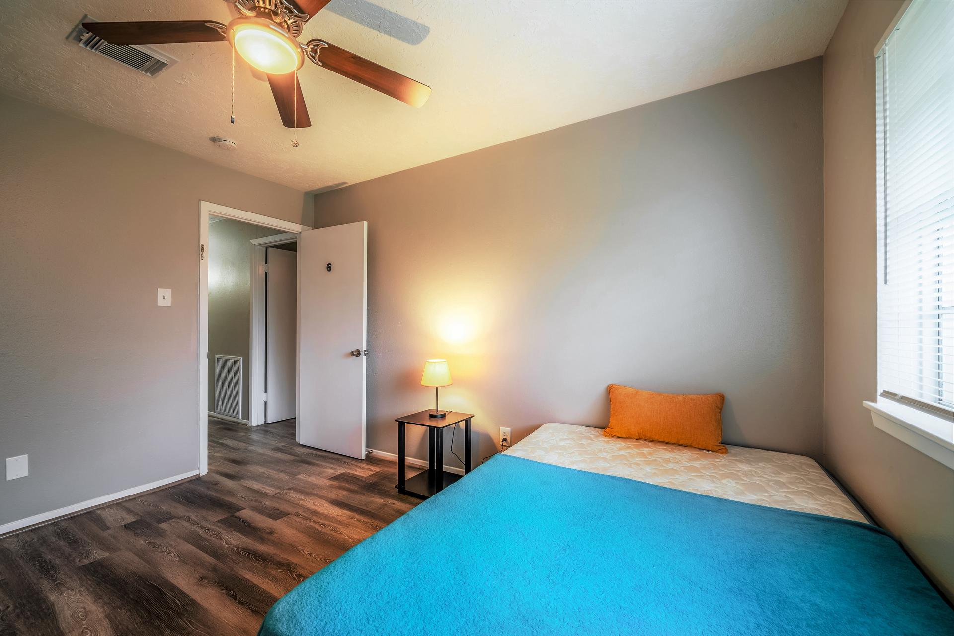 bedroom, detected: ceiling fan, bed, window blind
