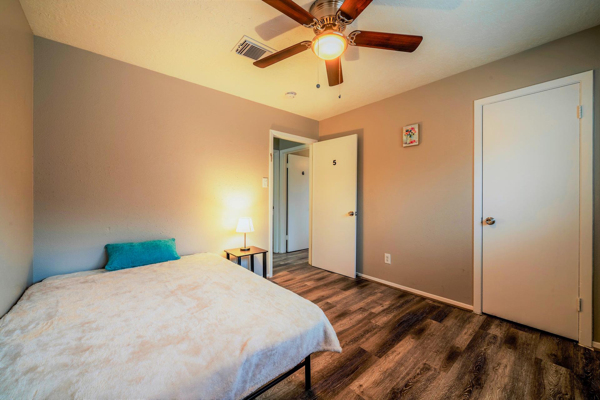 bedroom, detected: ceiling fan, bed, window blind