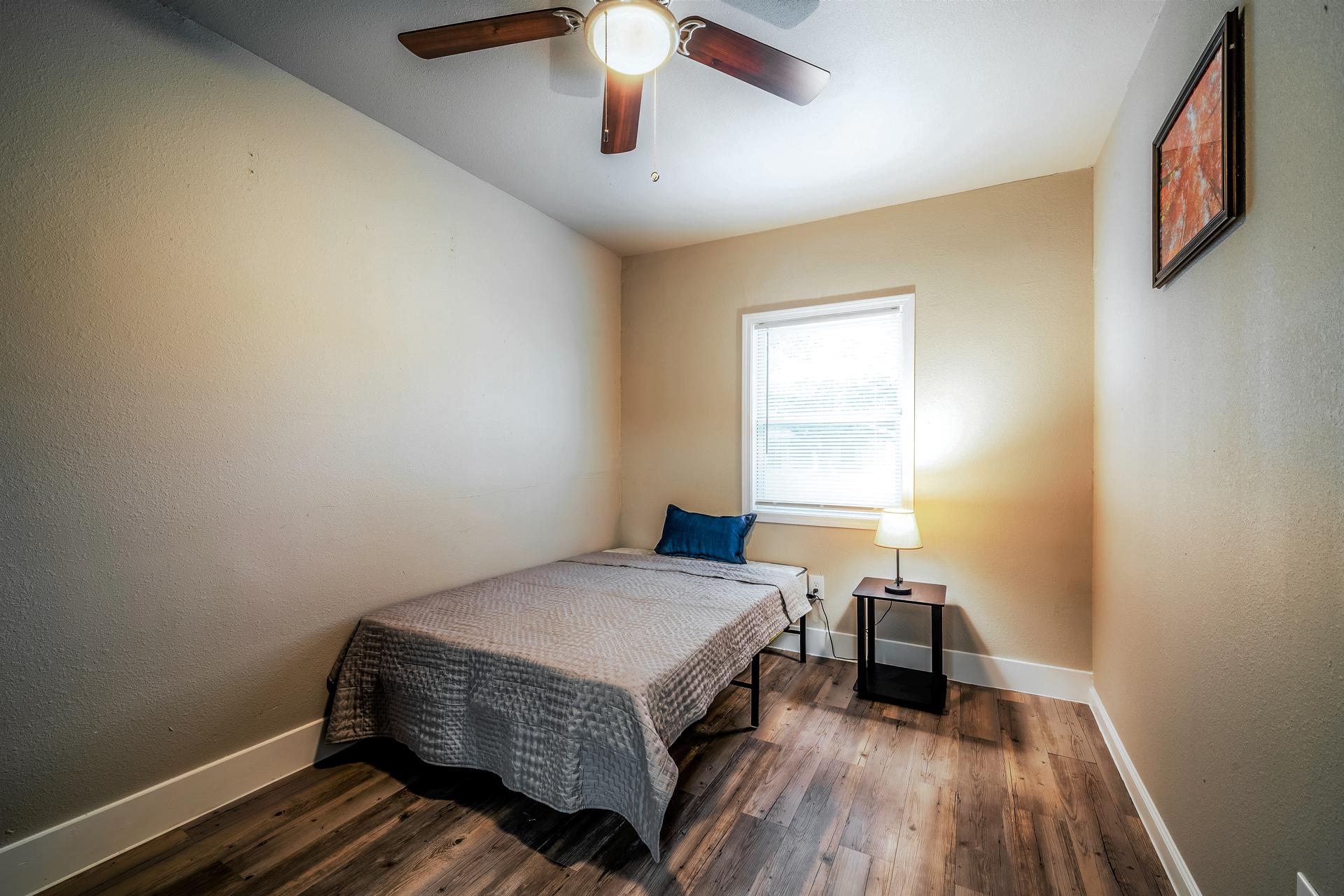 bedroom, detected: ceiling fan, window blind, bed
