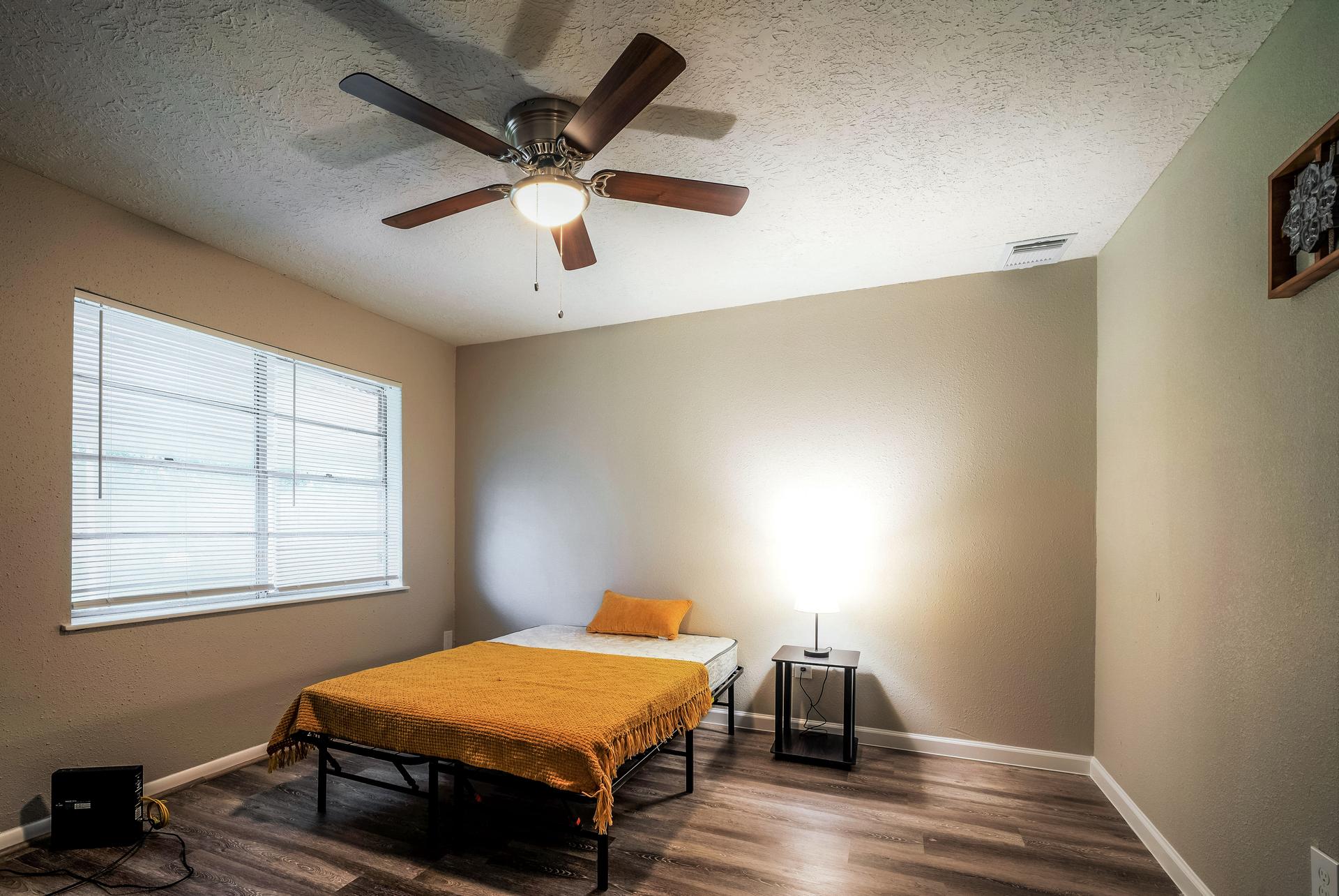 bedroom, detected: ceiling fan, window blind, bed
