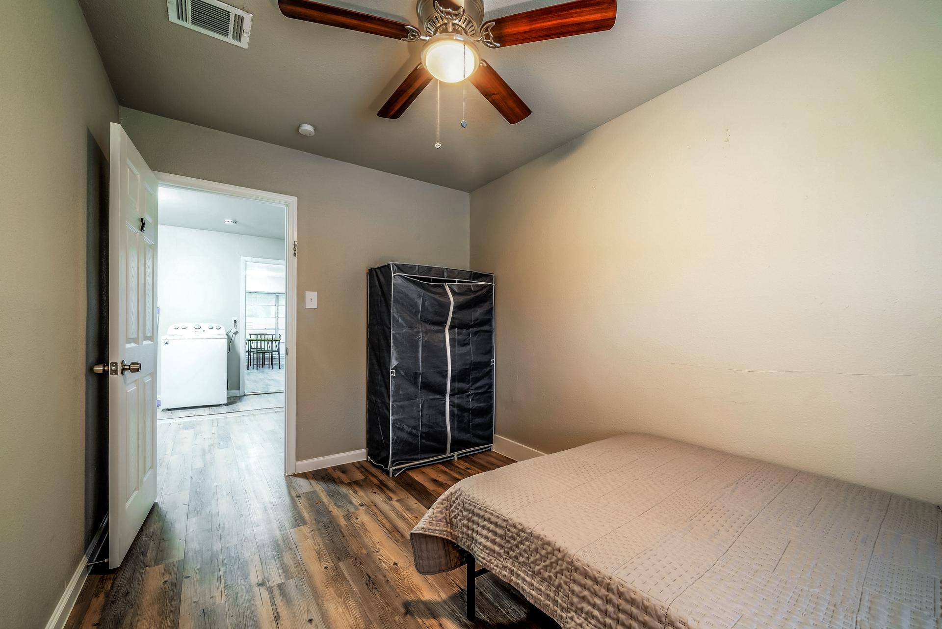 bedroom, detected: ceiling fan, window blind, bed
