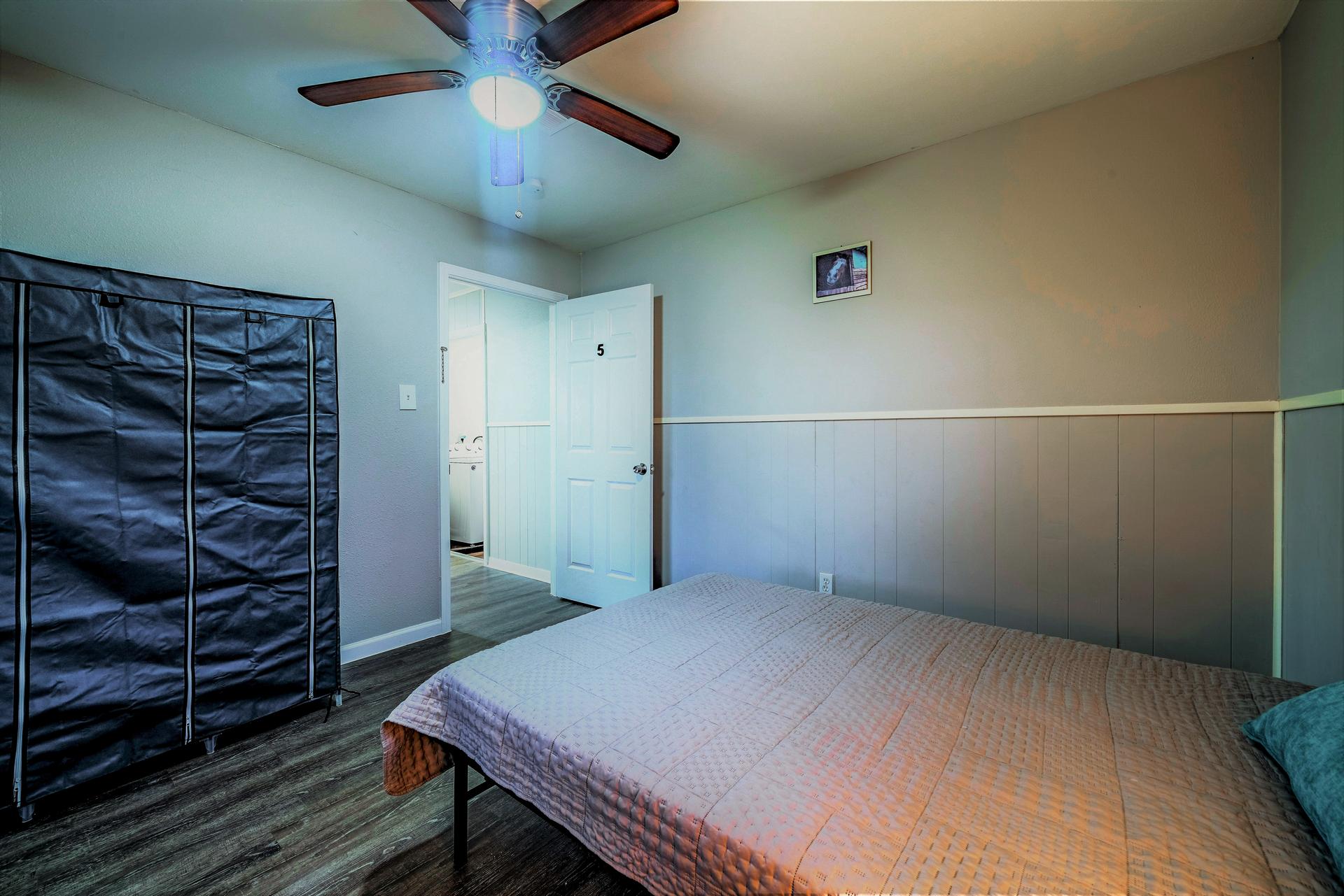 bedroom, detected: ceiling fan, bed, window blind