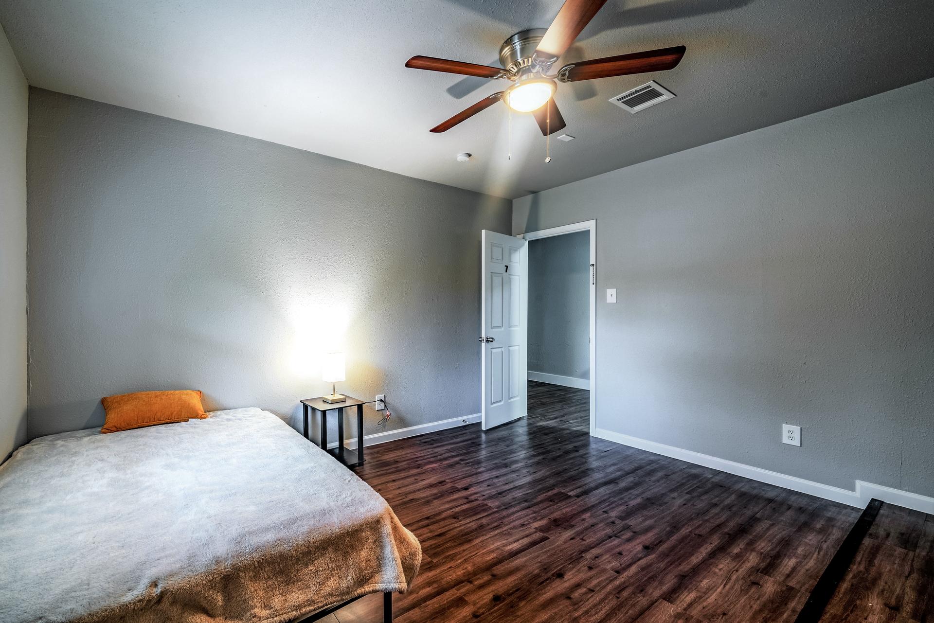 bedroom, detected: ceiling fan, bed, window blind