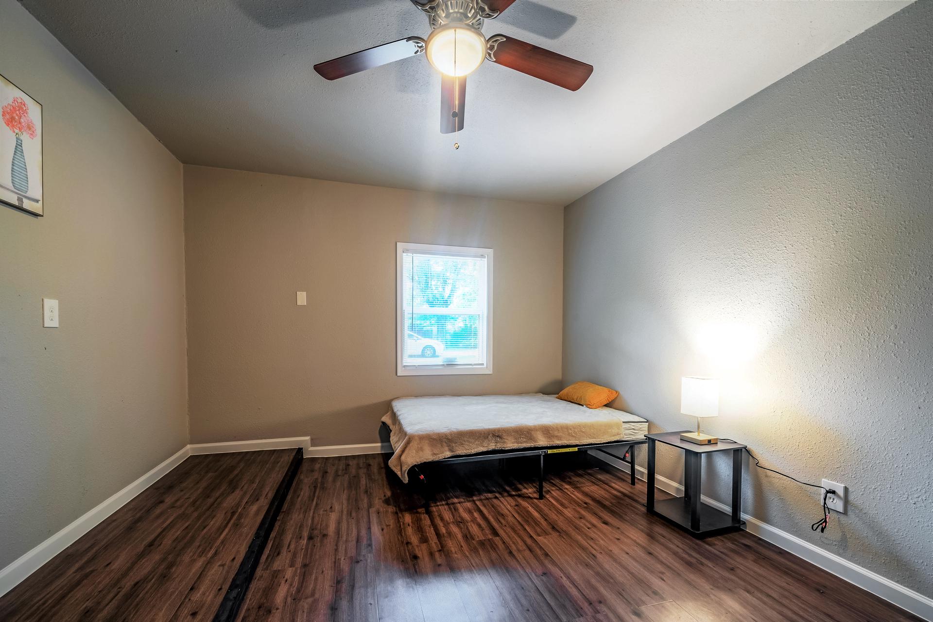 bedroom, detected: ceiling fan, window blind, bed