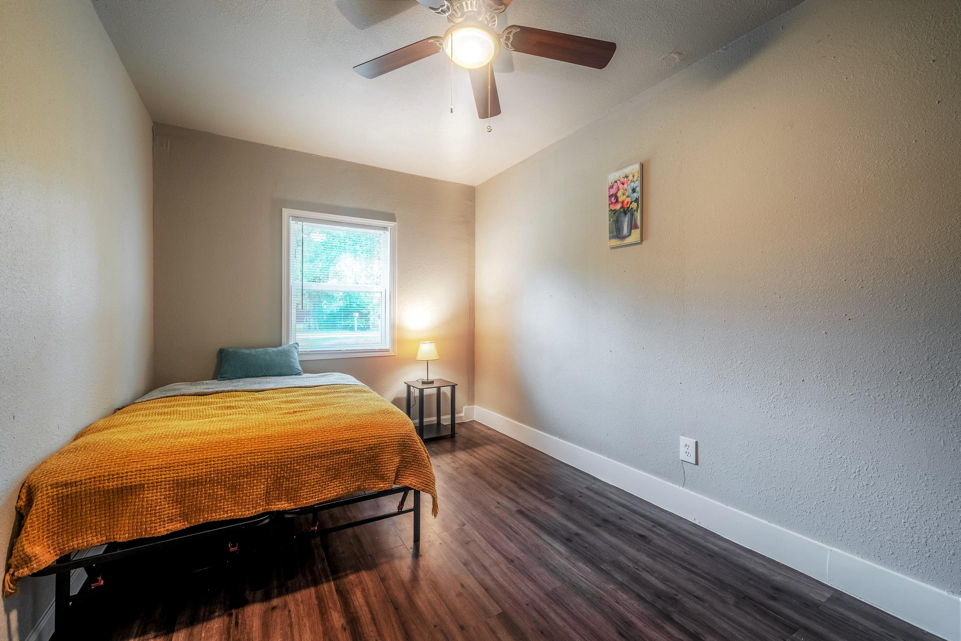 bedroom, detected: ceiling fan, bed, window blind