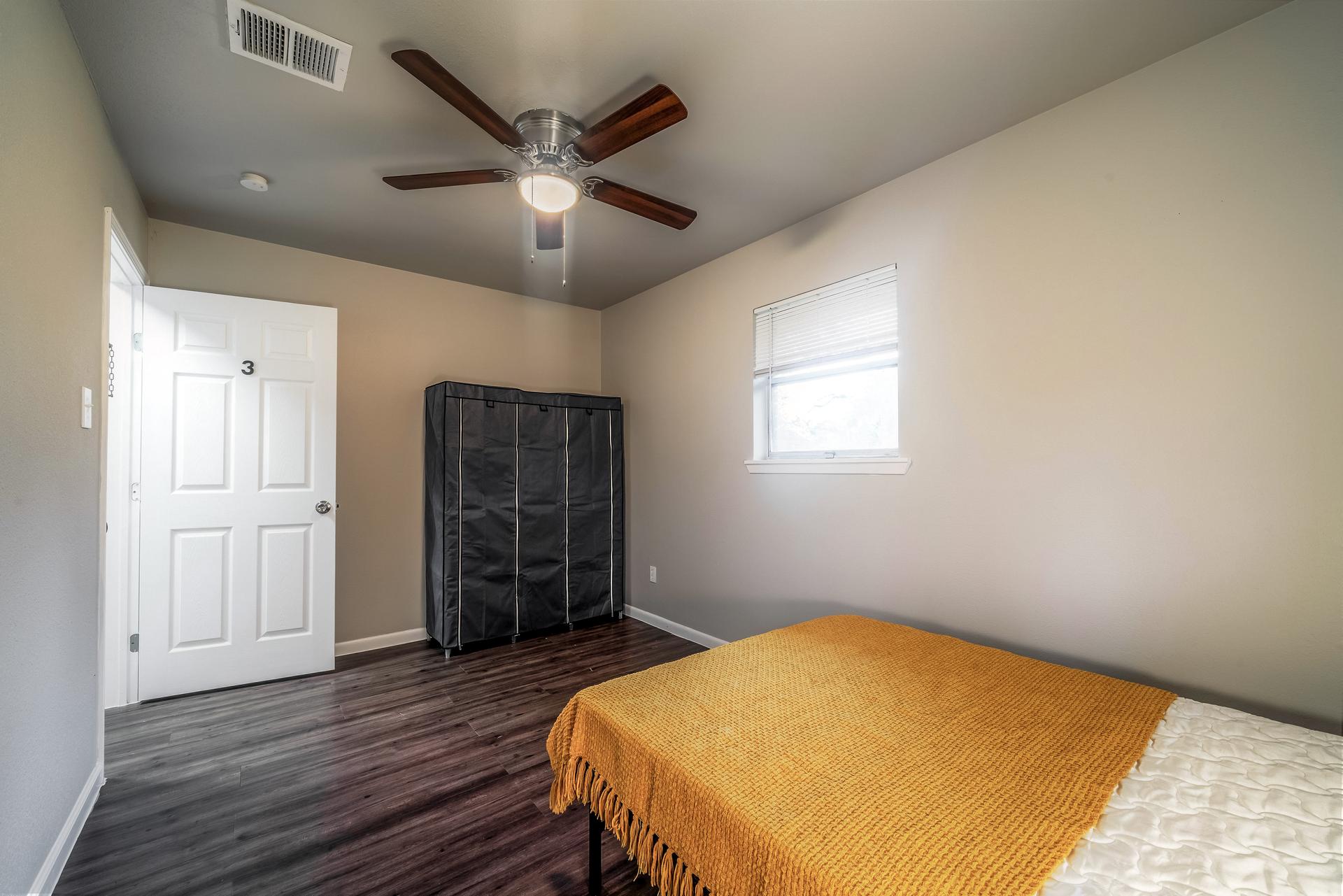 bedroom, detected: ceiling fan, window blind, bed