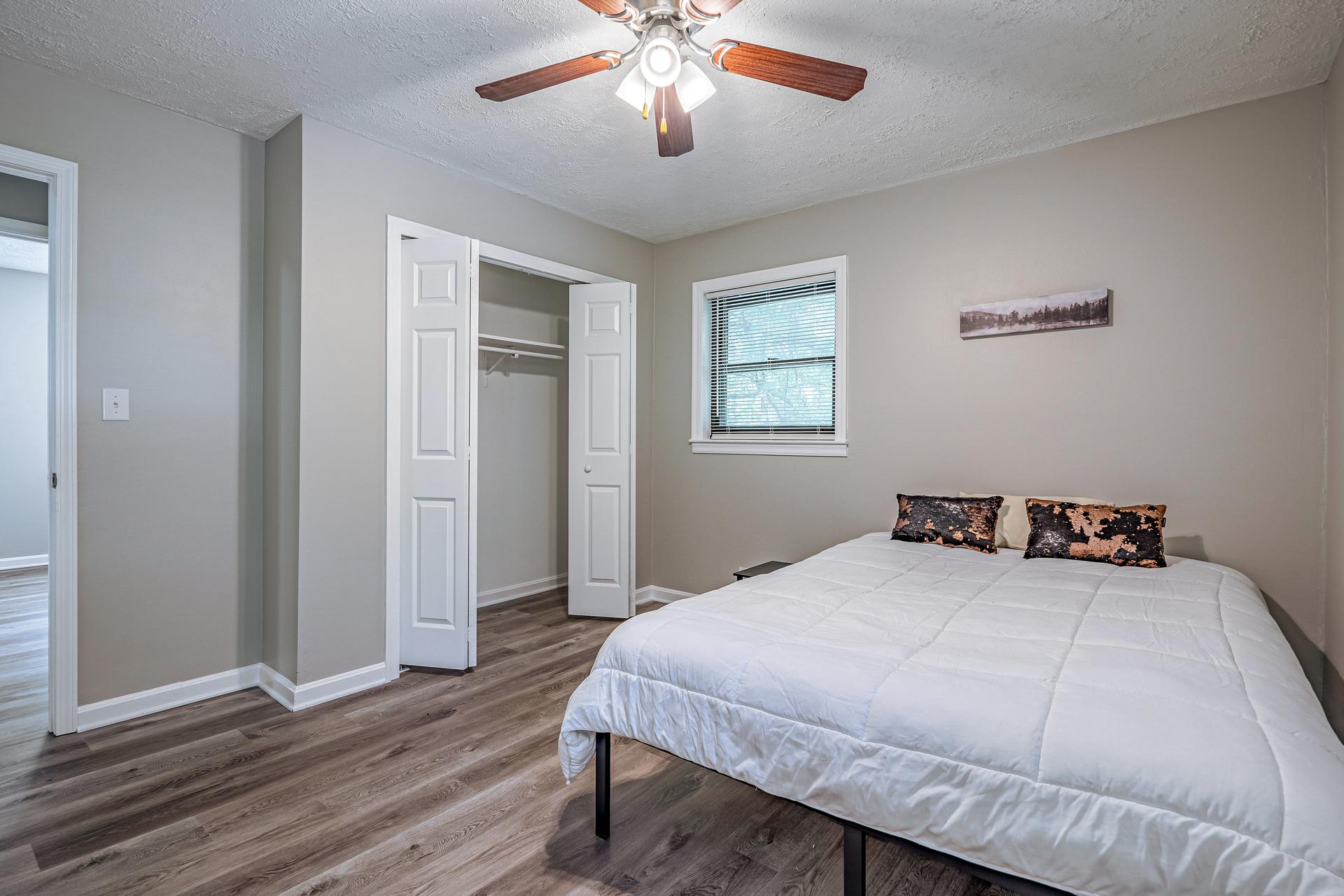 bedroom, detected: ceiling fan, bed, window blind