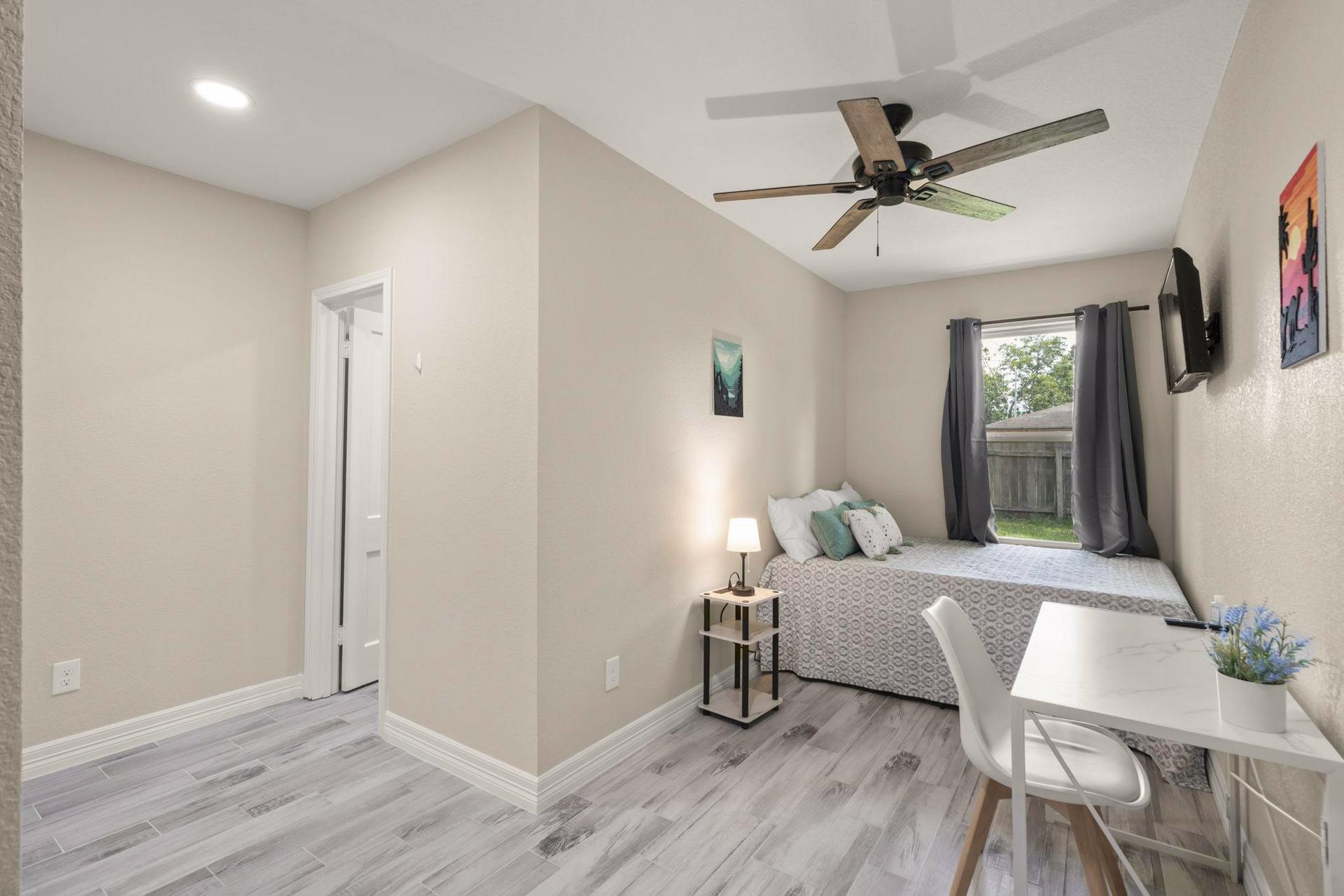 living_room, detected:ceiling fan, window blind