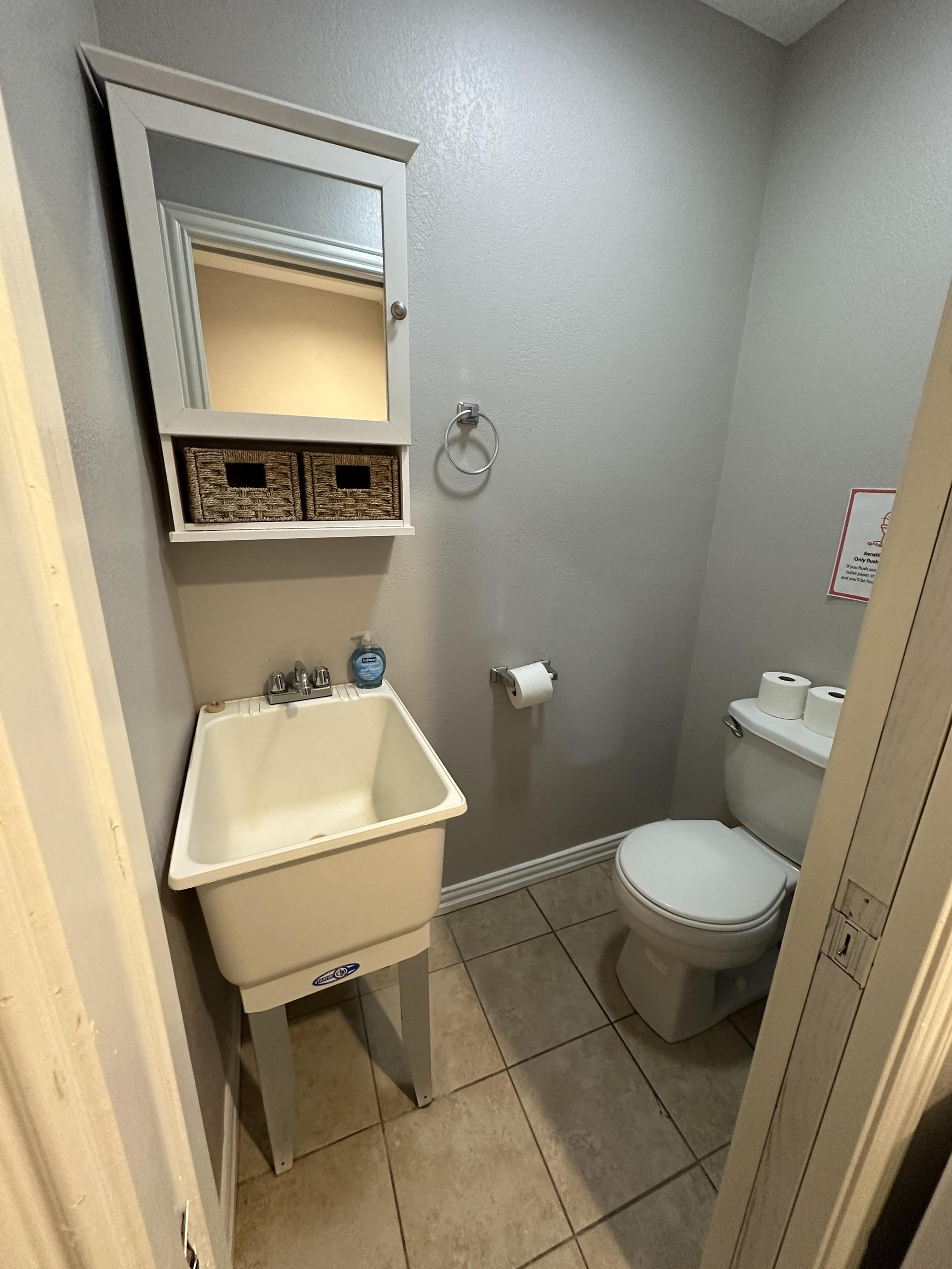 Shared half bath- Rooms 5, 6