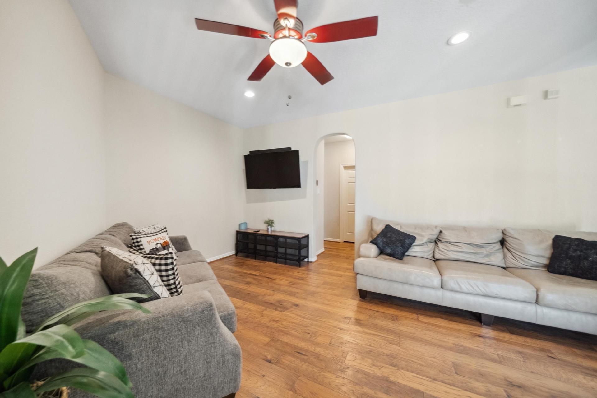View from Bedroom door into loft/common area