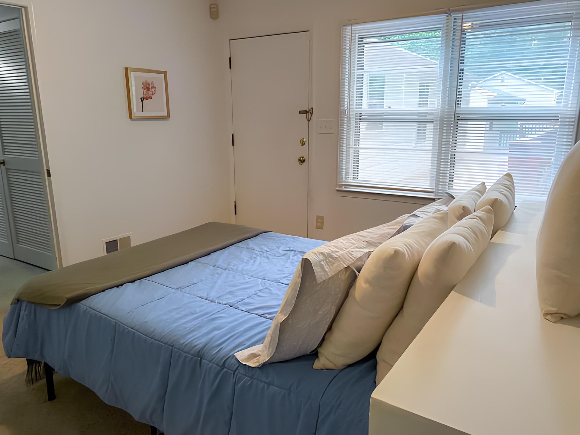 bedroom, detected: window blind, bed