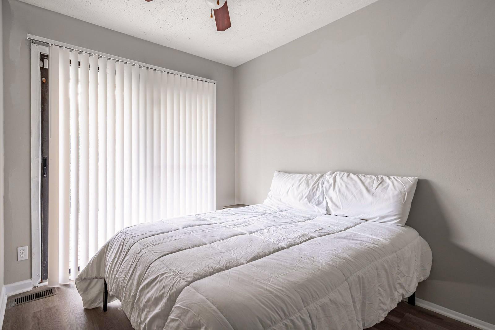 bedroom, detected:bed, ceiling fan, window blind