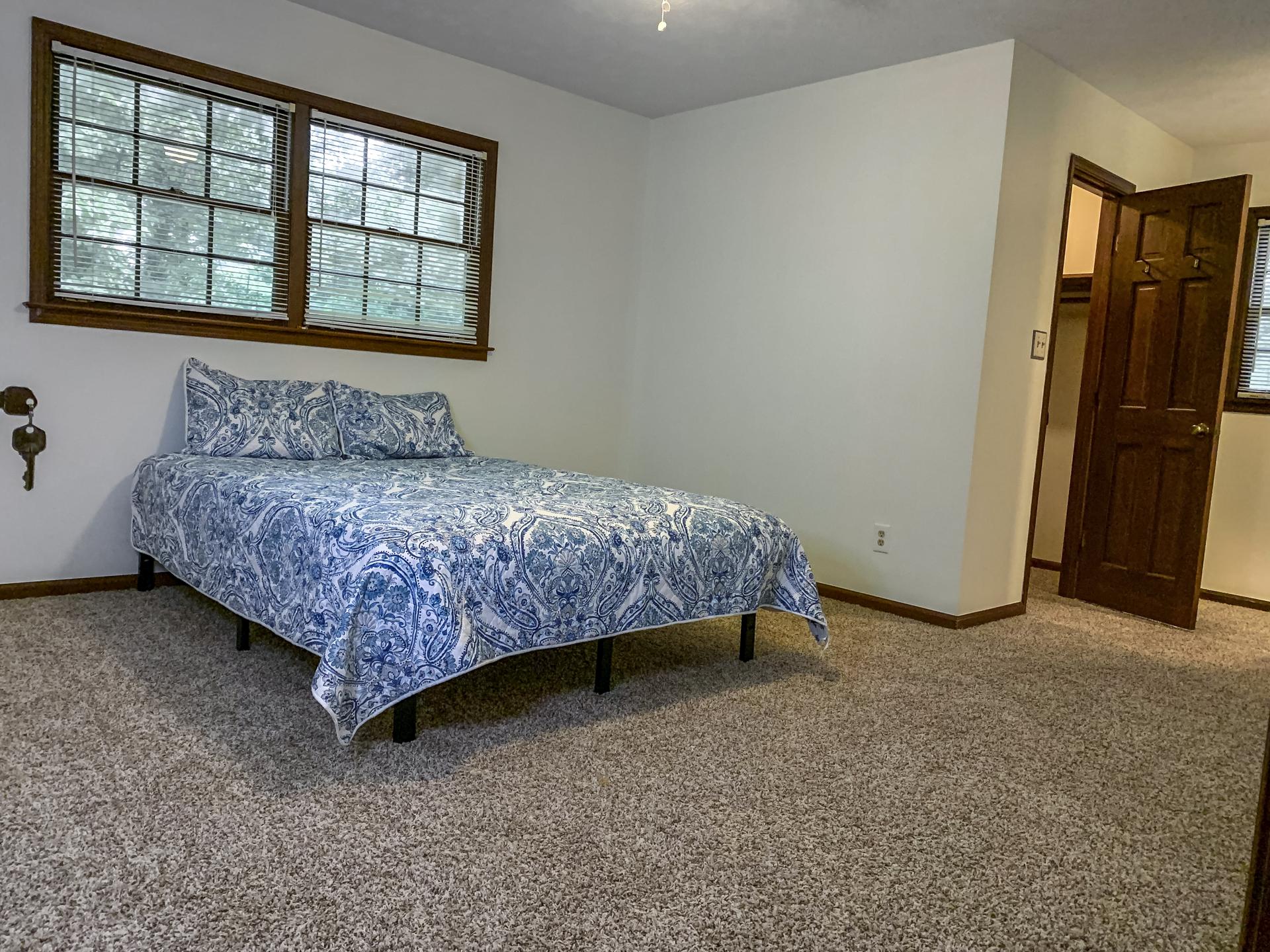 bedroom, detected: bed, window blind, carpet