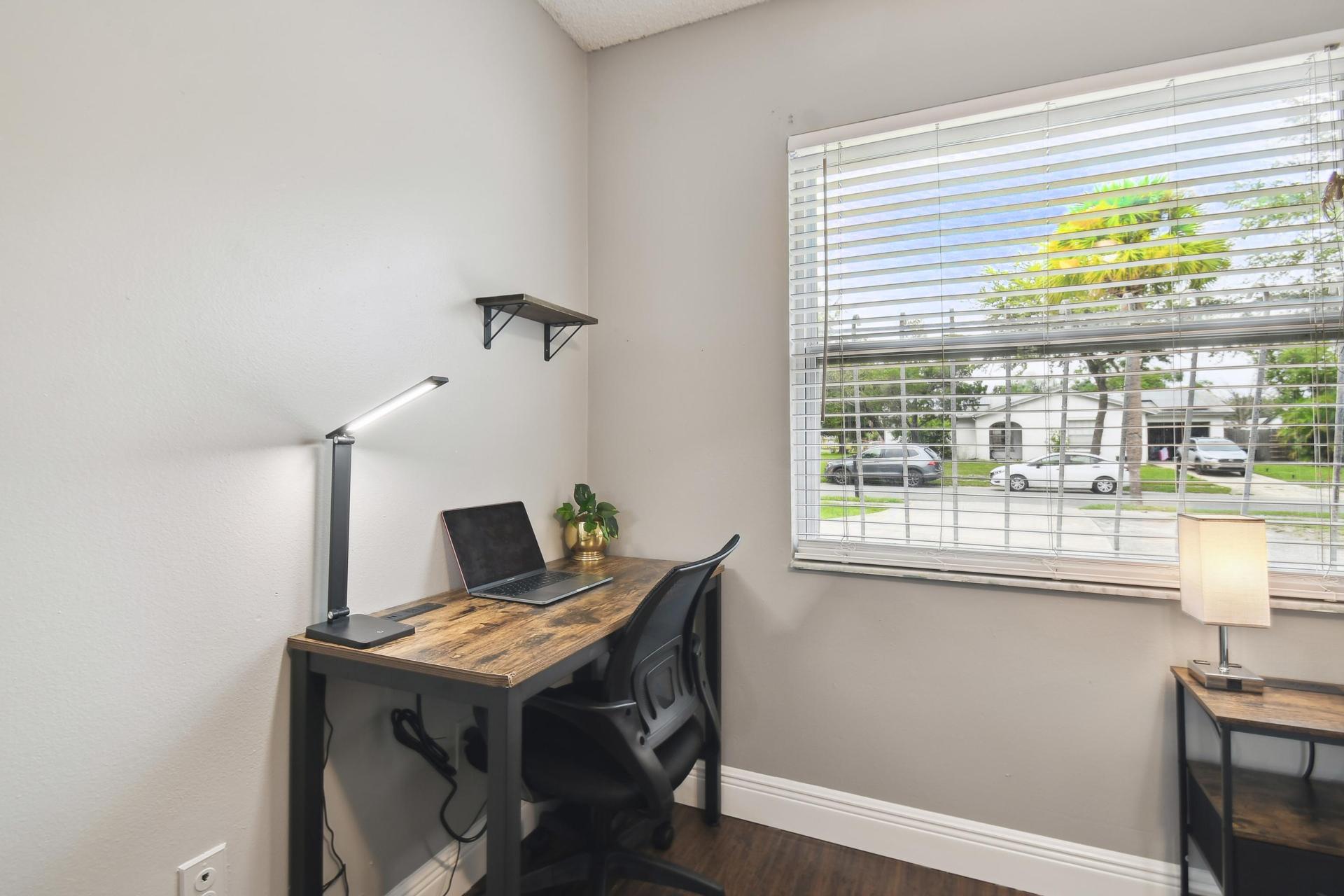 Office desk, chair and light