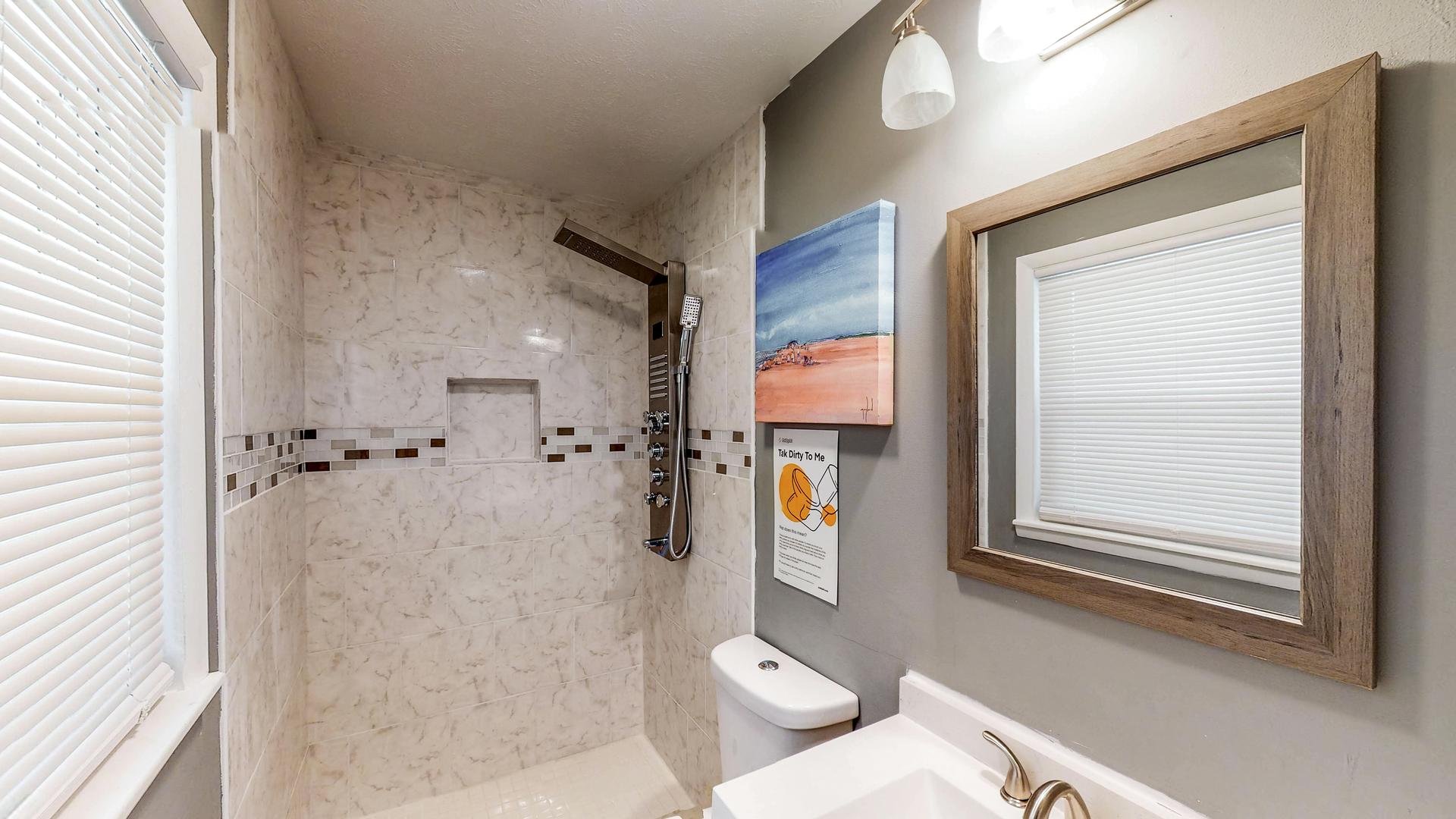 bathroom, detected: window blind, bathtub, shower