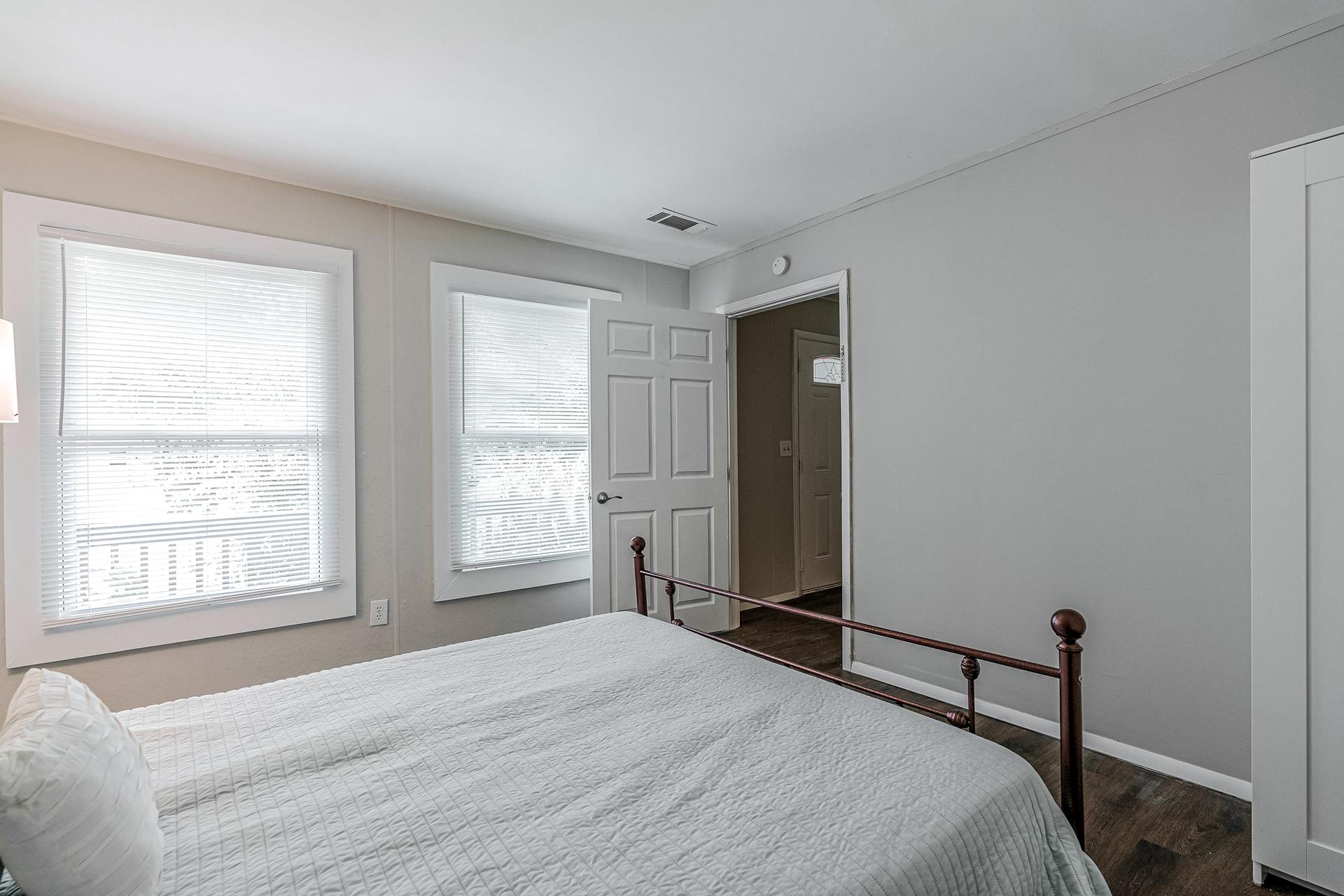 bedroom, detected: window blind, bed