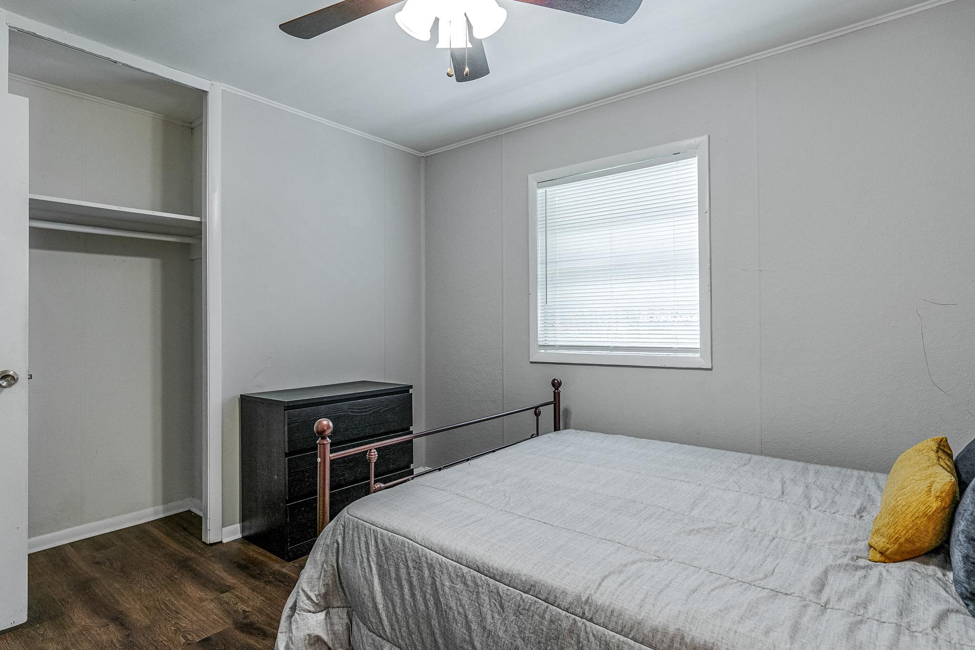 bedroom, detected: ceiling fan, window blind, bed