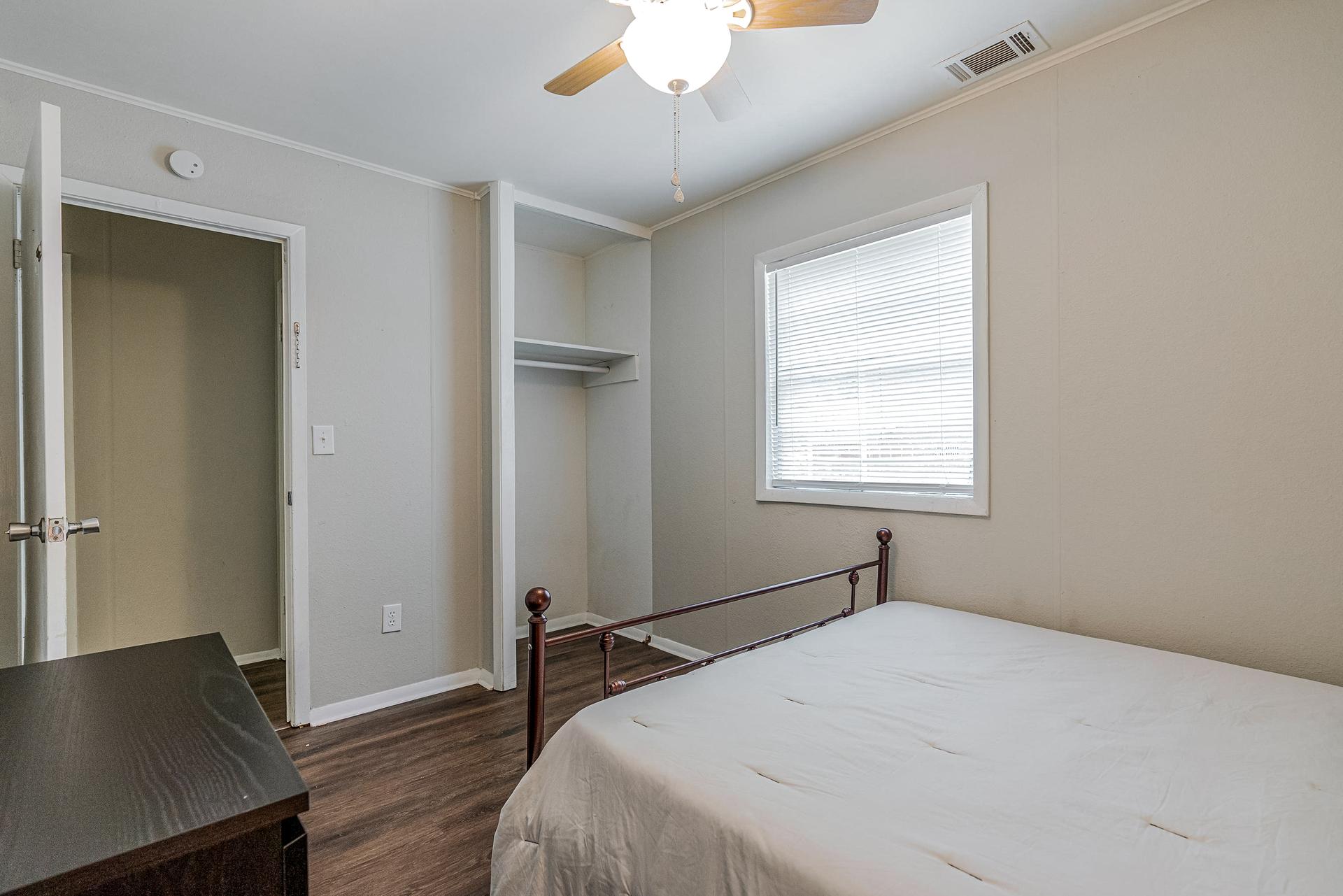 bedroom, detected: ceiling fan, window blind, bed