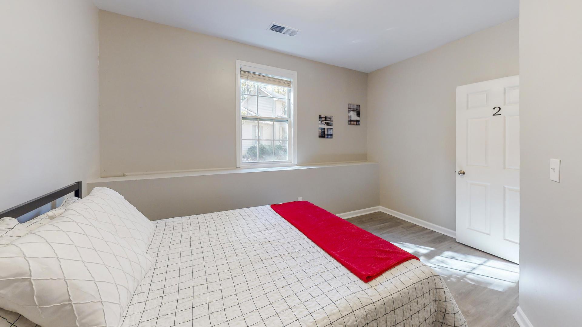 bedroom, detected: bed, window blind, carpet