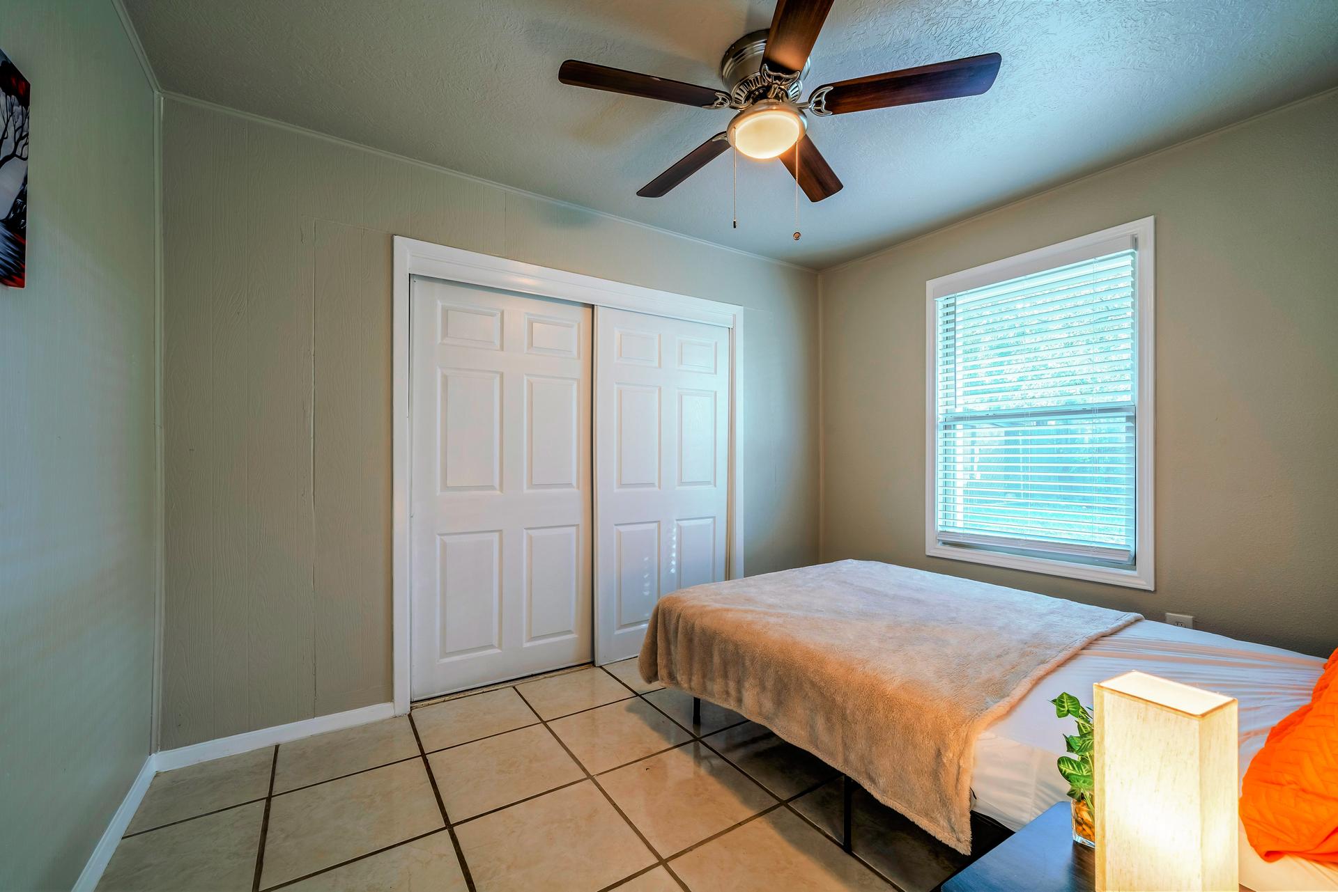 bedroom, detected: ceiling fan, window blind, bed