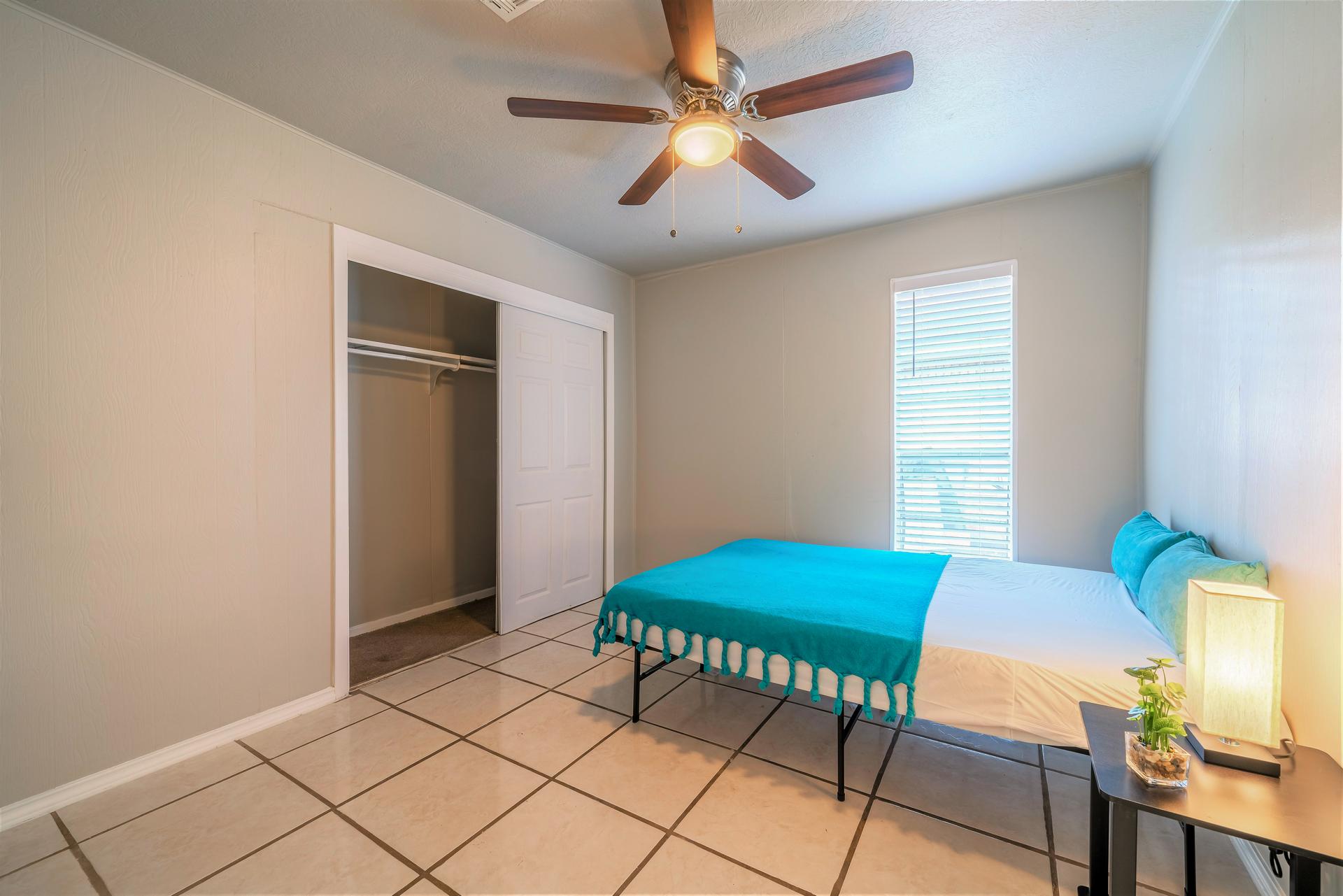bedroom, detected: ceiling fan, window blind, bed