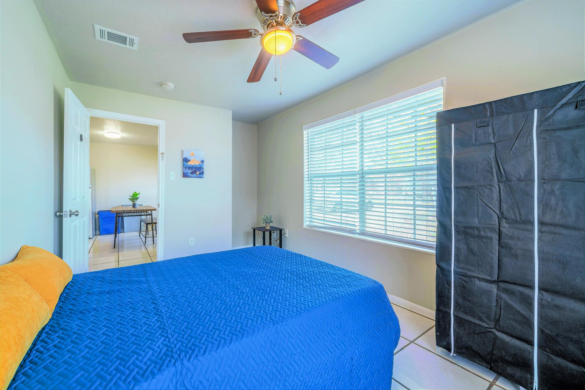 bedroom, detected: ceiling fan, window blind, bed