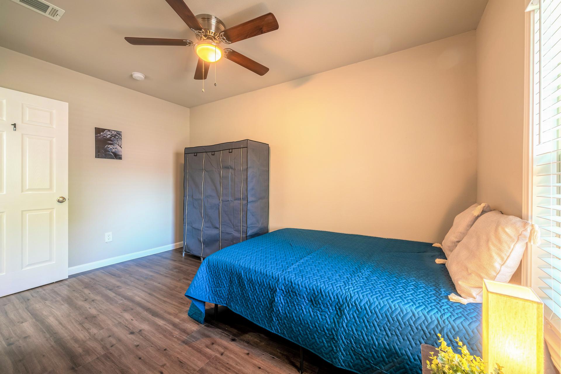 bedroom, detected: ceiling fan, window blind, bed