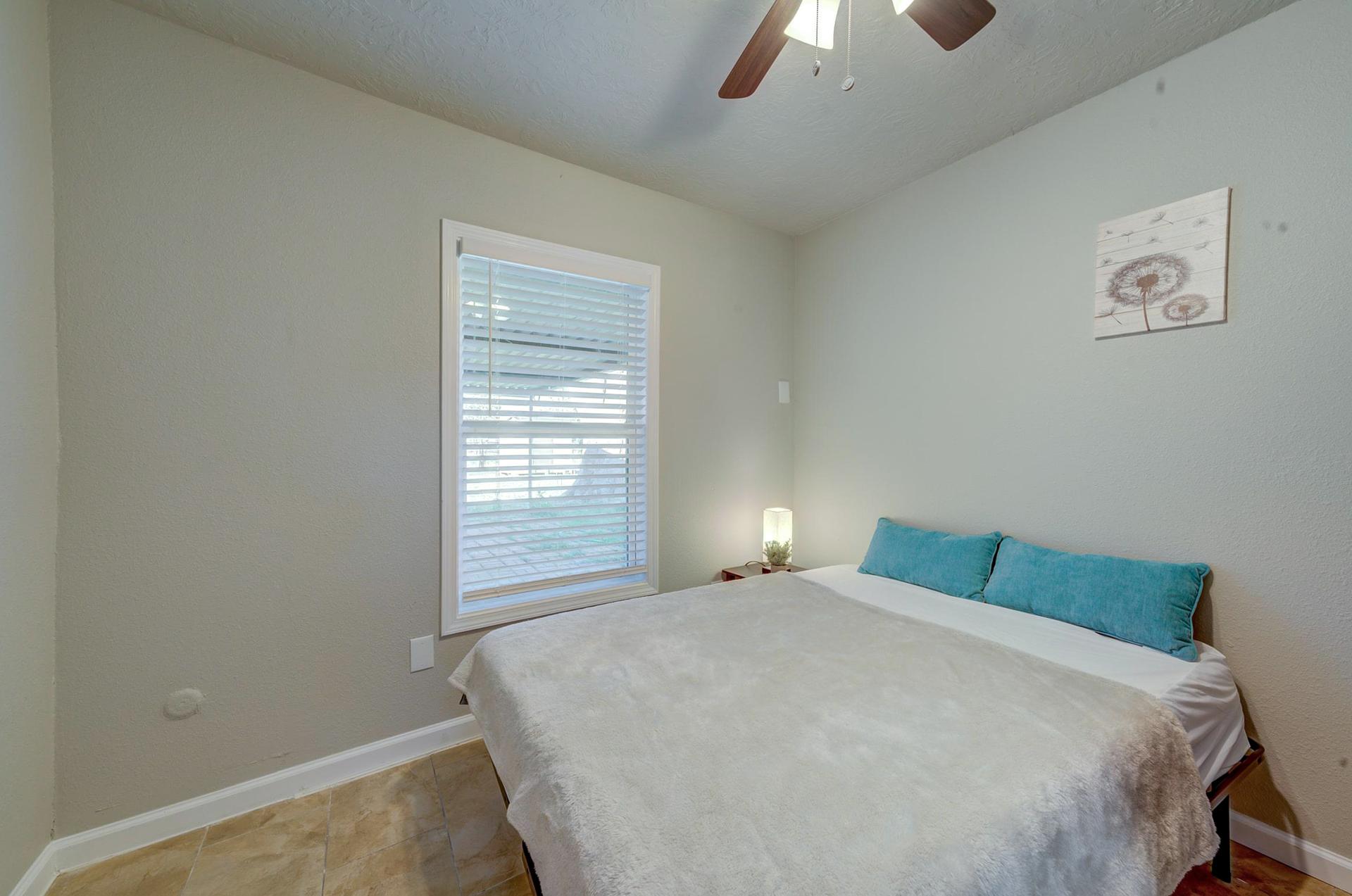 bedroom, detected: ceiling fan, window blind, bed
