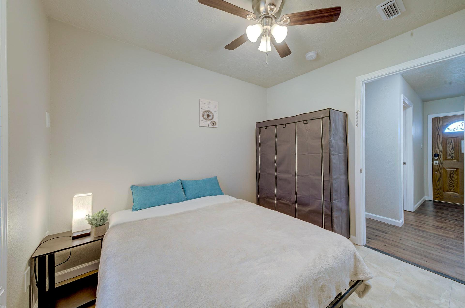 bedroom, detected: ceiling fan, bed, window blind