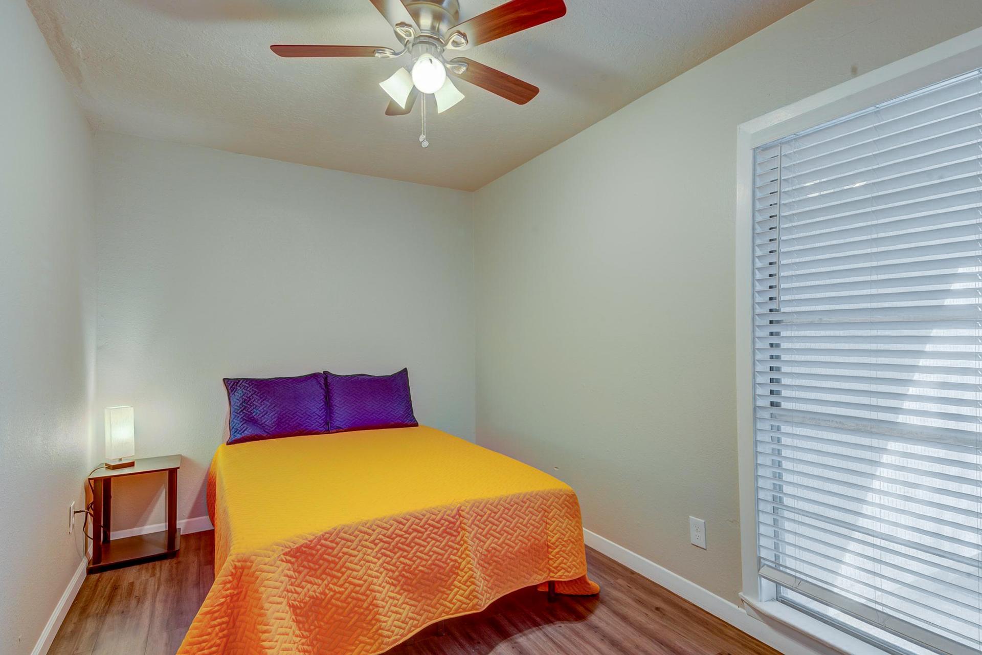 bedroom, detected: ceiling fan, window blind, bed