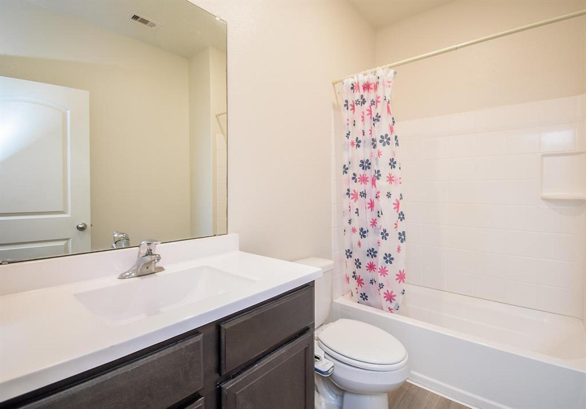 Shared bathroom, with shower and tub