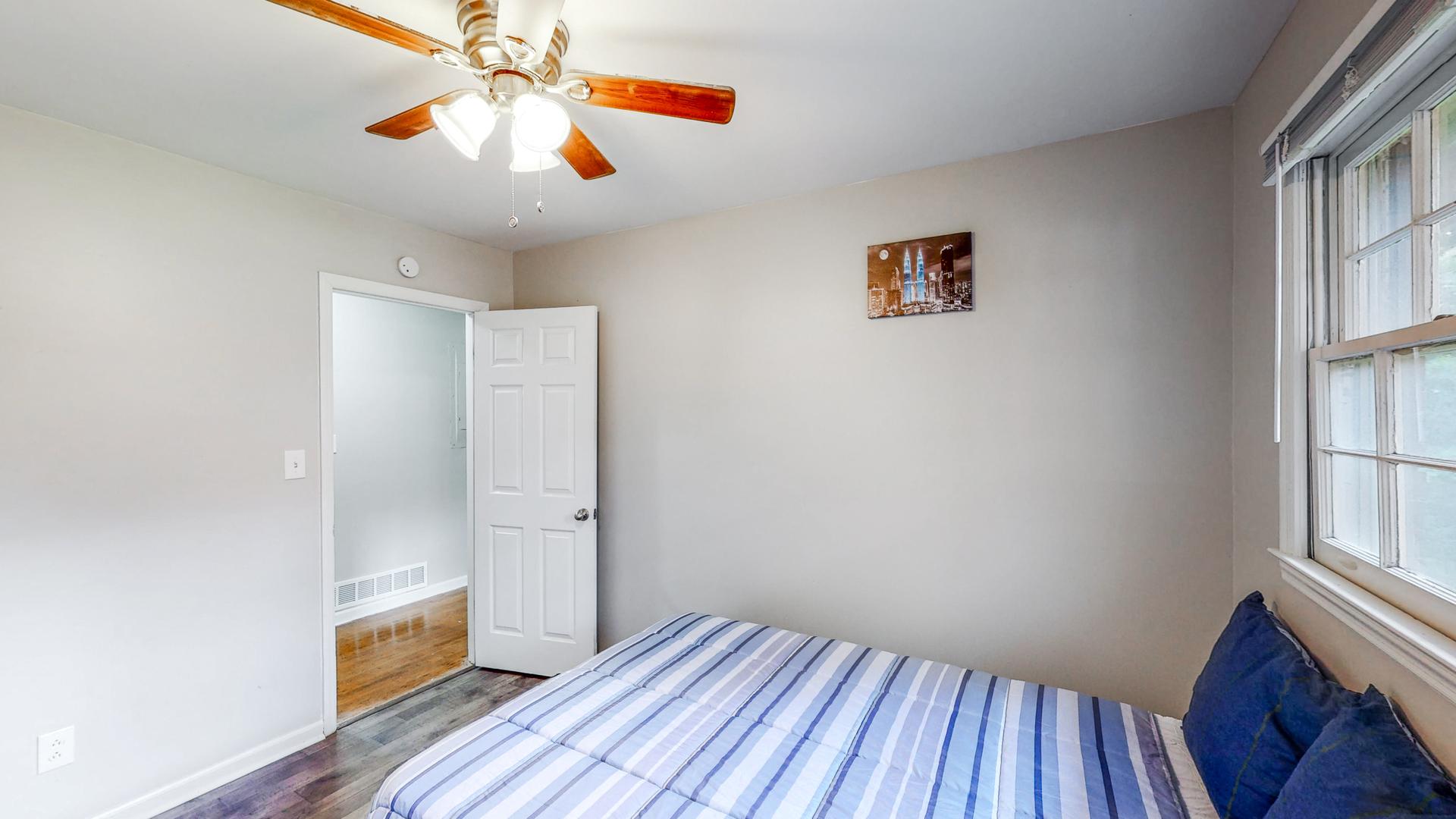 bedroom, detected: ceiling fan, bed, window blind