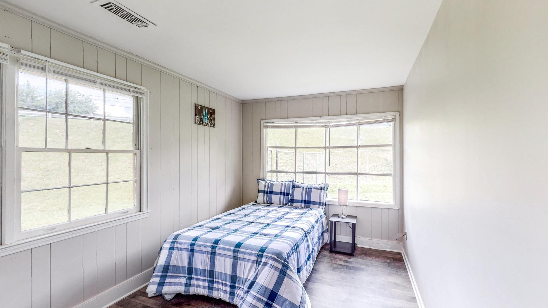 bedroom, detected: window blind, bed