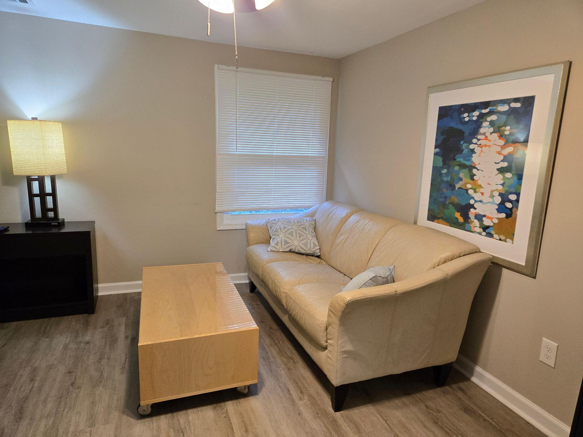 Watch TV from sofa or bed - coffee table has wheels