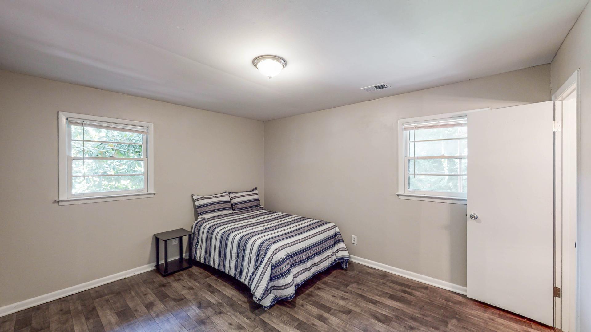 bedroom, detected: window blind, bed