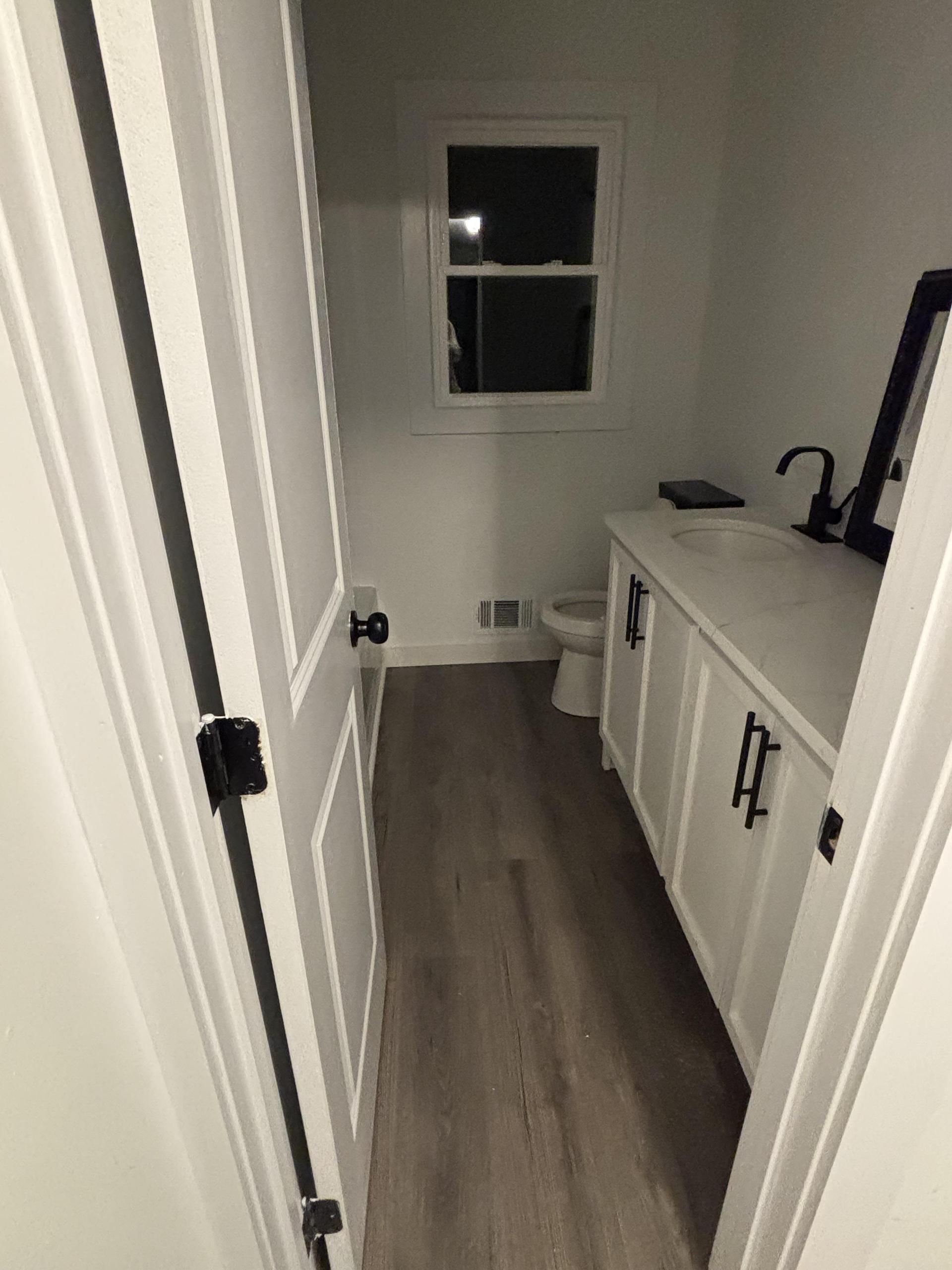 Shared bathroom with tub and shower